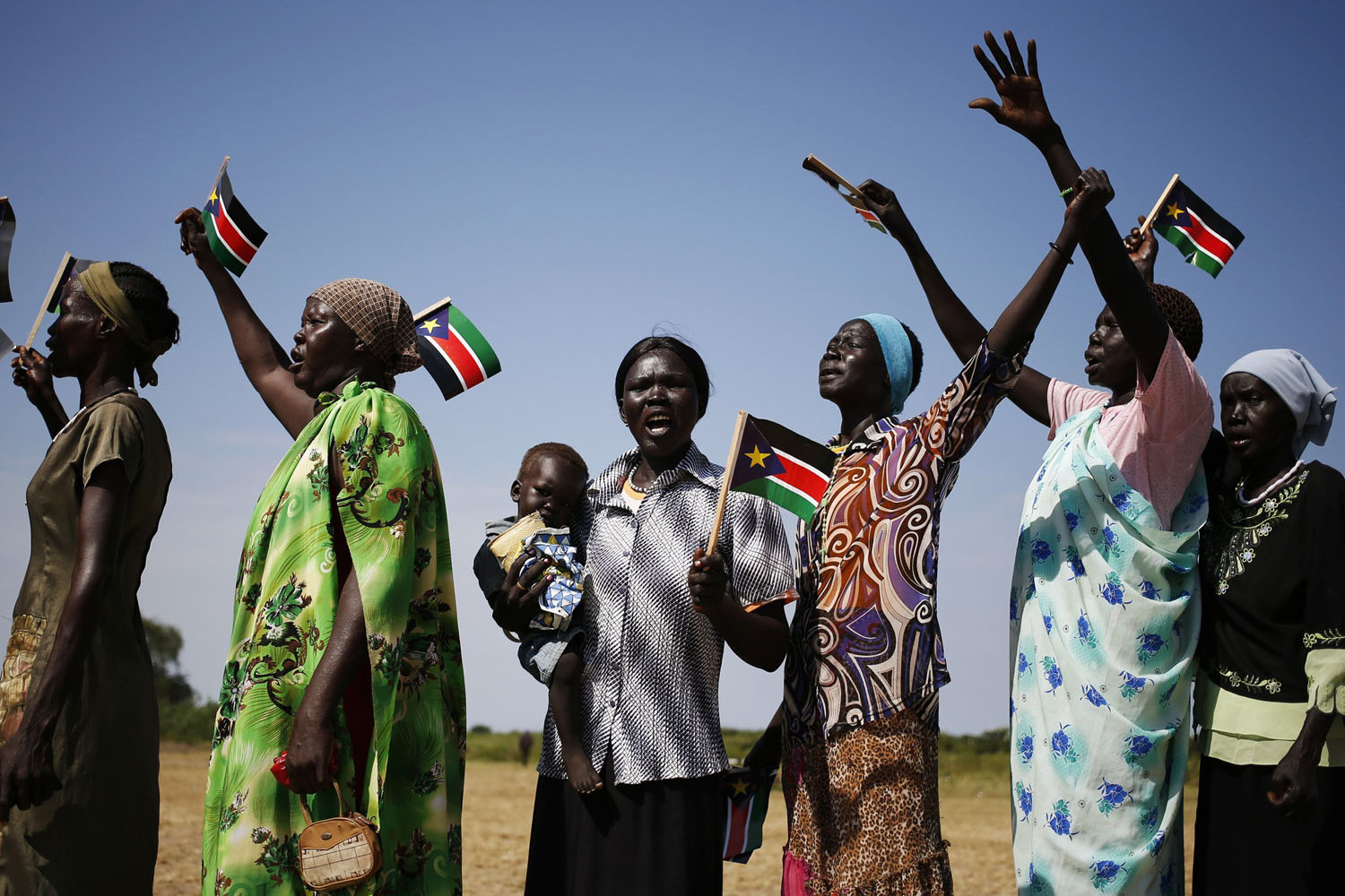 Women sing during a rally in the town of Abyei ahead of the referendum