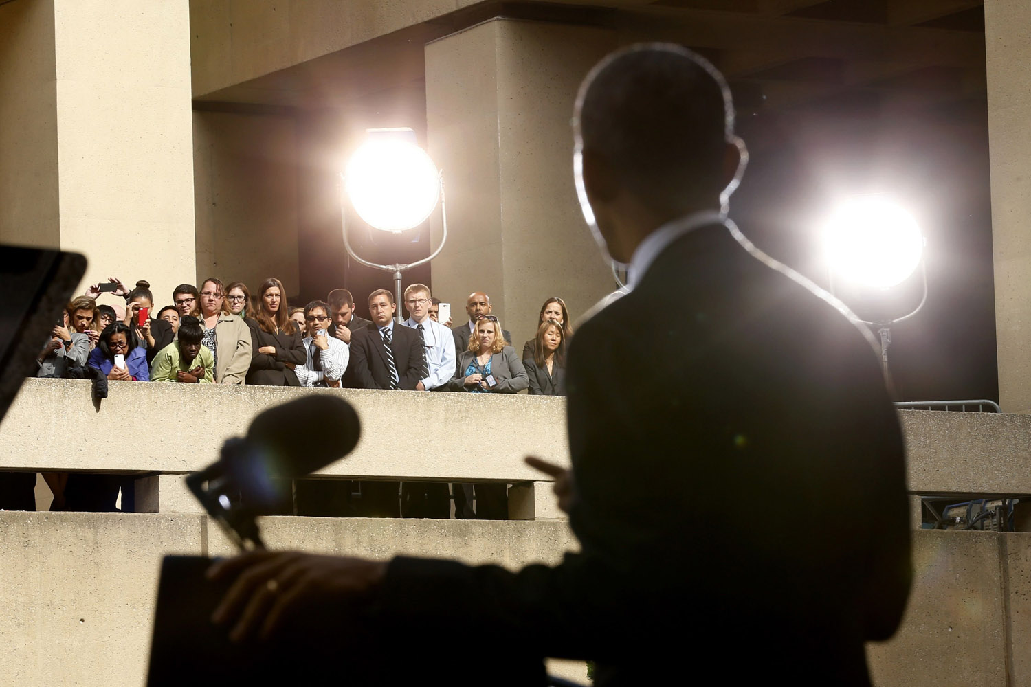 Oct. 28, 2013. FBI employees listen as U.S. President Barack Obama speaks during the inauguration ceremony for new FBI Director James Comey (not pictured) at the FBI Headquarters in Washington.