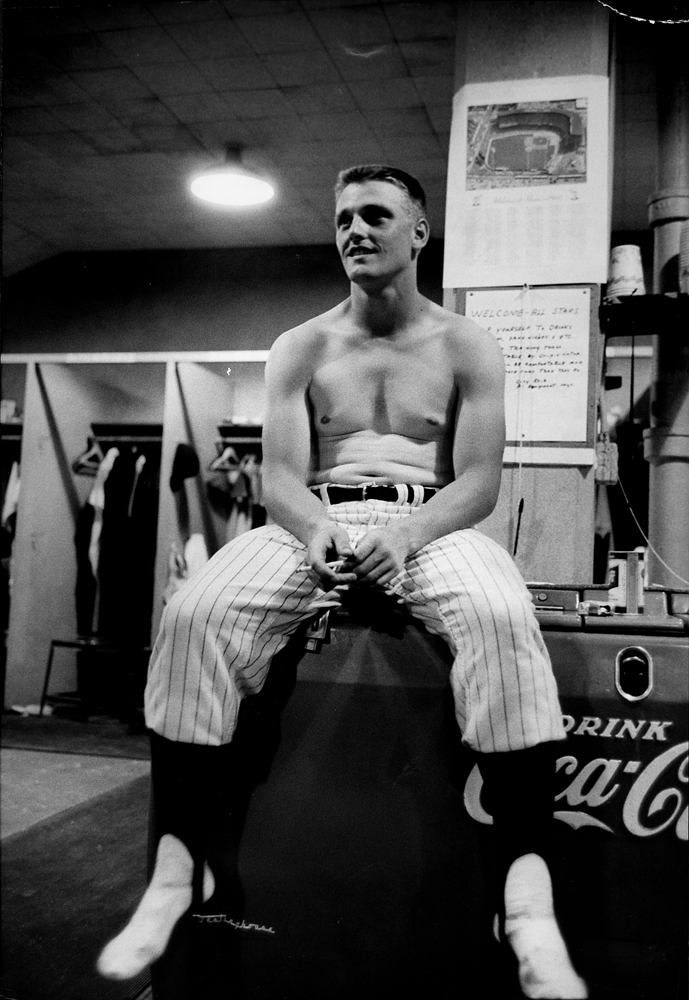 Roger Maris smokes a cigarette in the locker room at the 1960 All-Star Game in Kansas City.