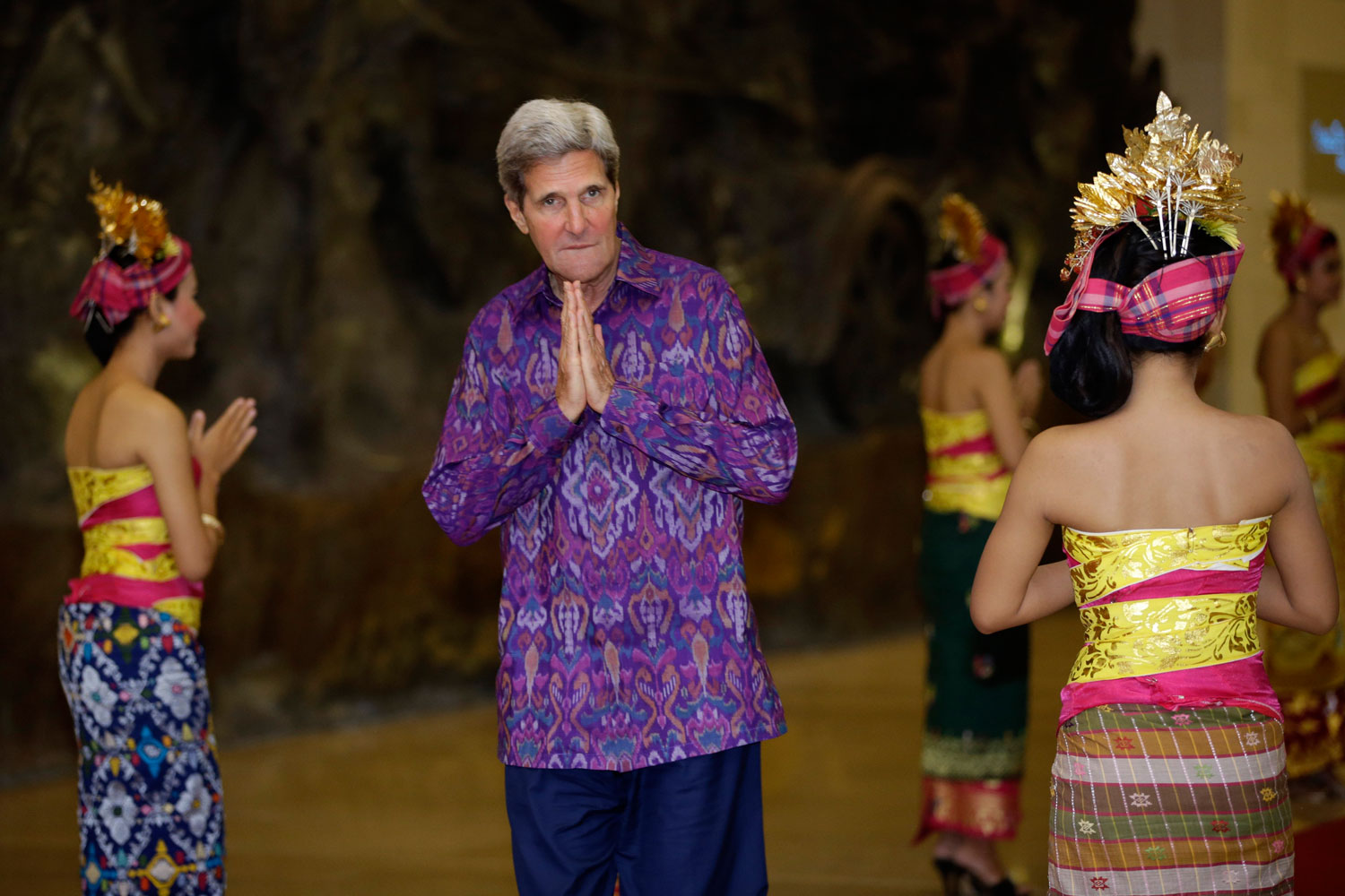 Oct. 7, 2013. U.S. Secretary of State John Kerry, wearing 'endek', a traditional Balinese woven fabric, arrives at a dinner for leaders of the Asia-Pacific Economic Cooperation forum in Bali.