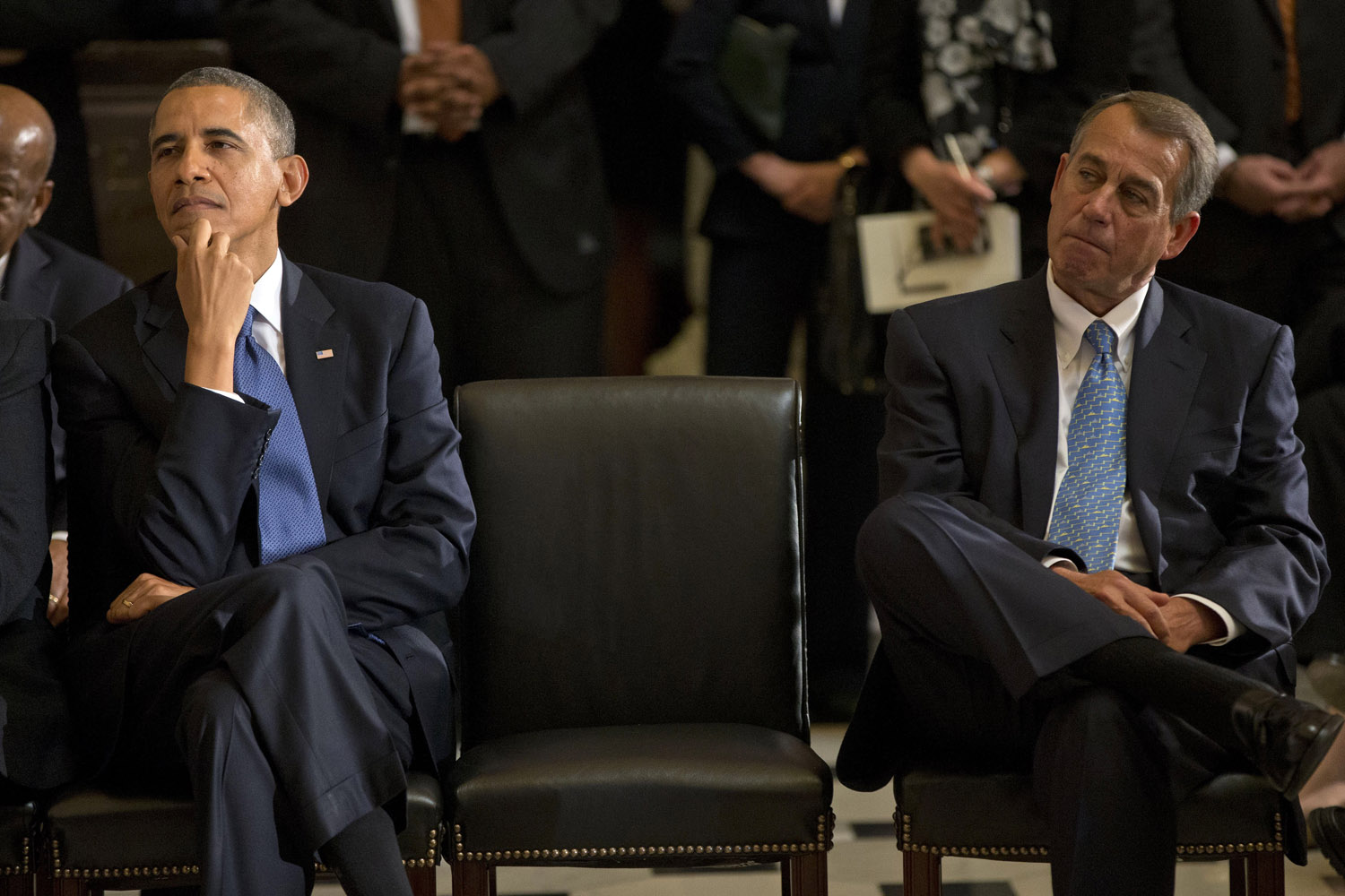 Oct. 29, 2013. President Barack Obama sits with House Speaker John Boehner of Ohio during memorial service for former House Speaker Tom S. Foley in Statuary Hall on Capitol Hill in Washington.