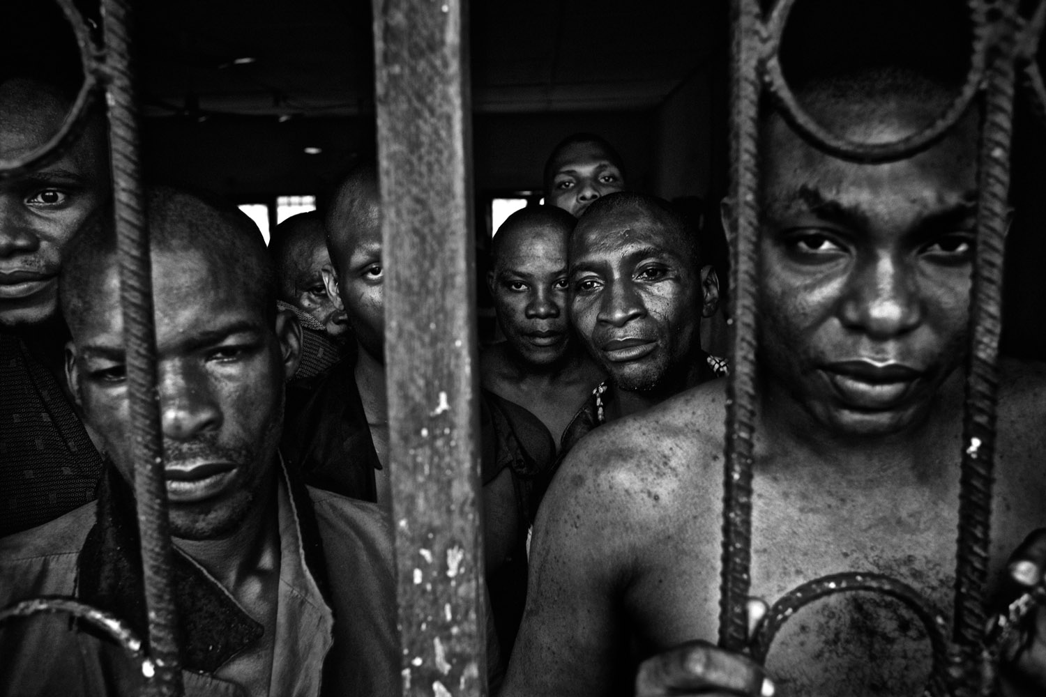 This Government run facility in the Niger Delta town of Eket is meant to be a Psychiatric hospital. In reality it is a prison. The oil industry that has brought billions of dollars into the Nigerian economy has arguably been a disaster for the Delta region from where it is extracted. Corruption, mass inequality and violence have plagued the region ever since the discovery of the resource. The Niger Delta, Nigeria. October 2012. Photo Robin Hammond/Panos