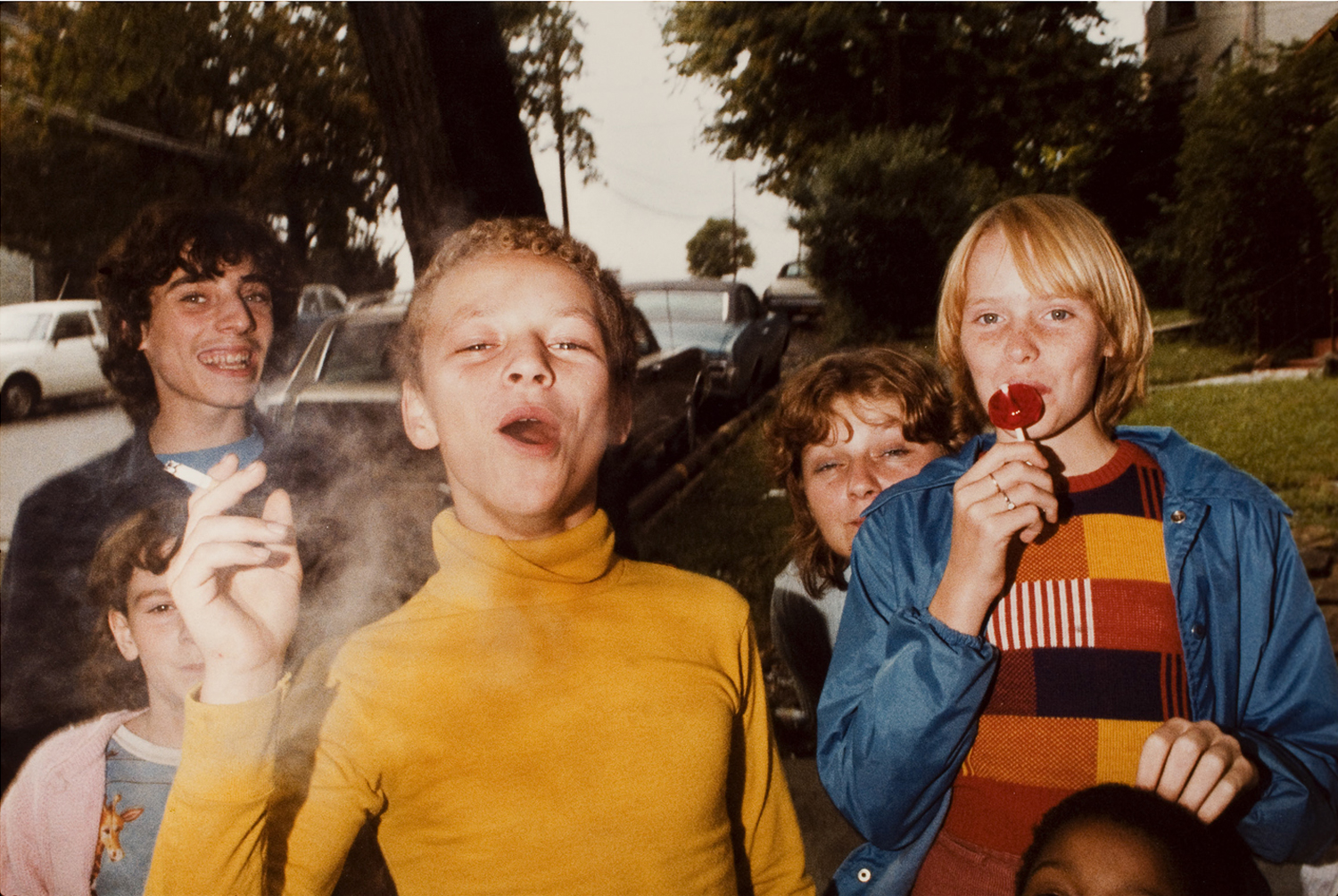 Mark Cohen (b. 1943)Boy in Yellow Shirt Smoking, 1977Dye imbibition print, 16 x 20 inchesGeorge Eastman House, International Museum of Photography and Film78:641:34