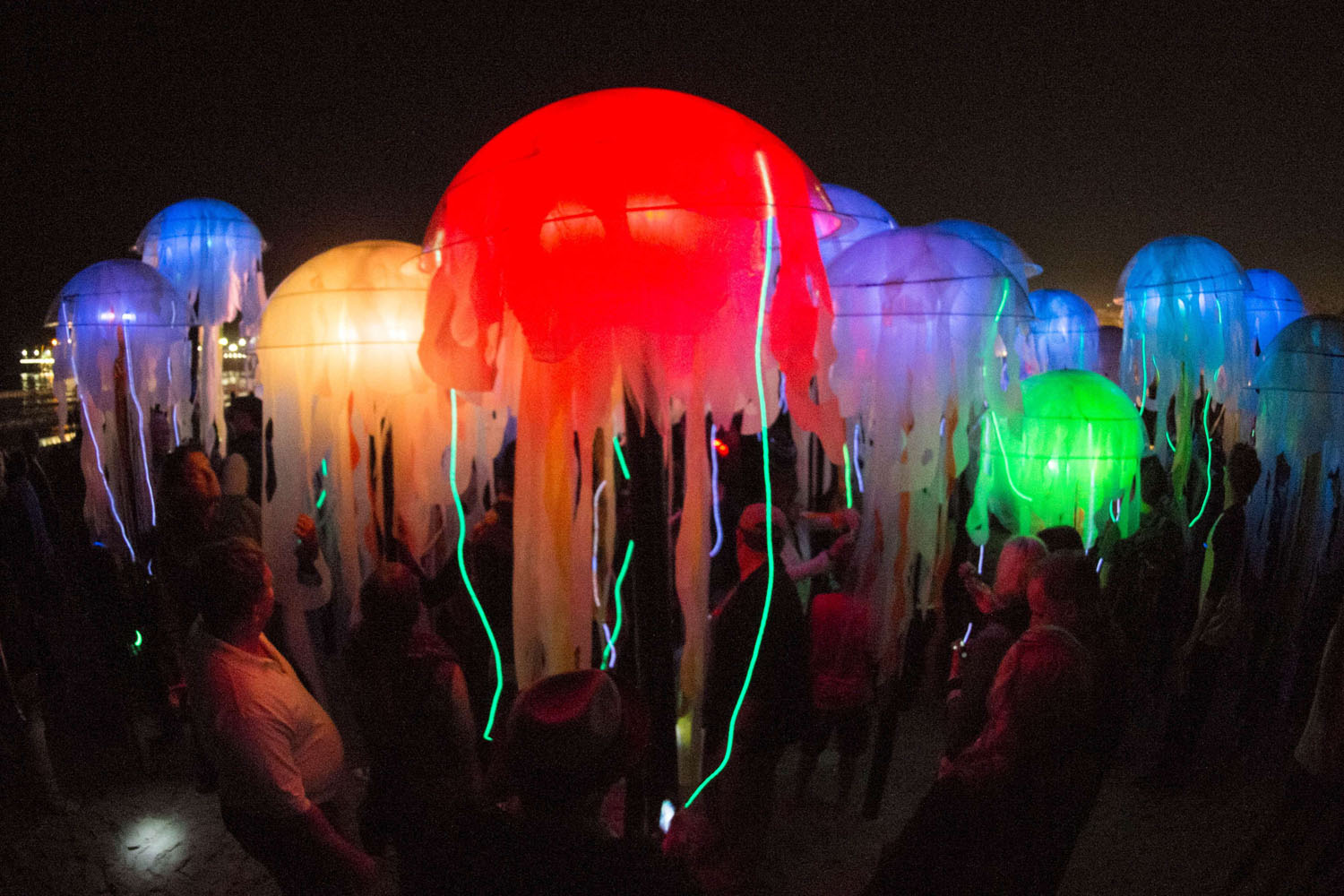 Sept. 29, 2013. Visitors explore Swarm of interactive jellyfish created by the group of artists Aphidoidea during Glow 2013 at the beach in Santa Monica, Calif.