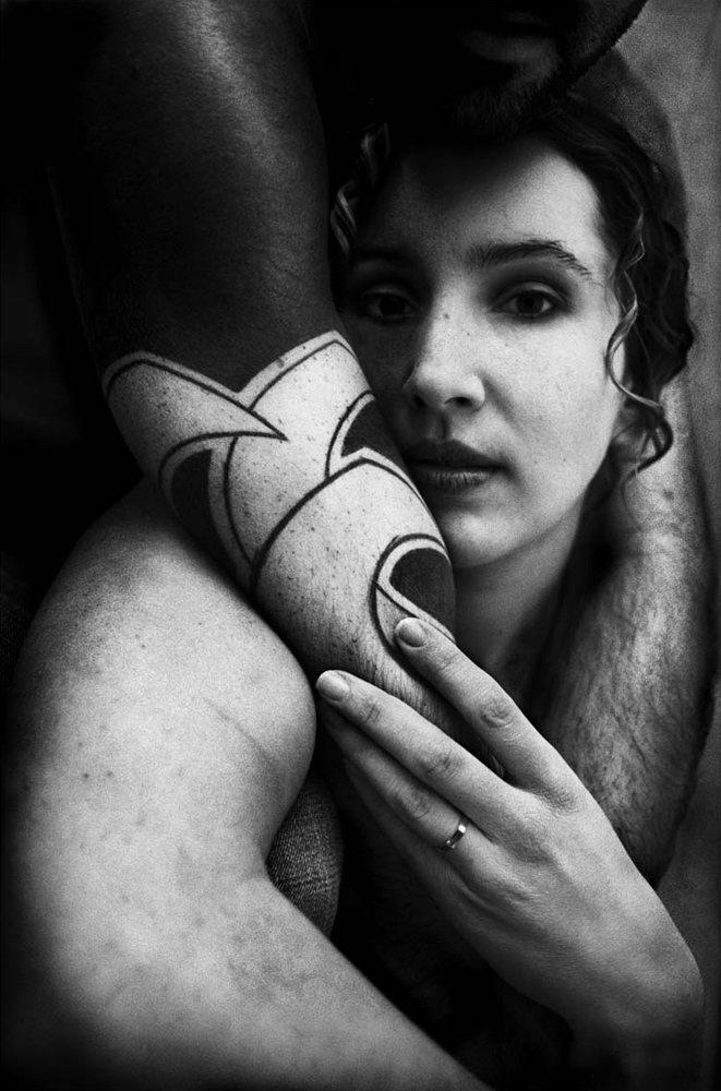 Woman with tattooed arm, Paris, 2006