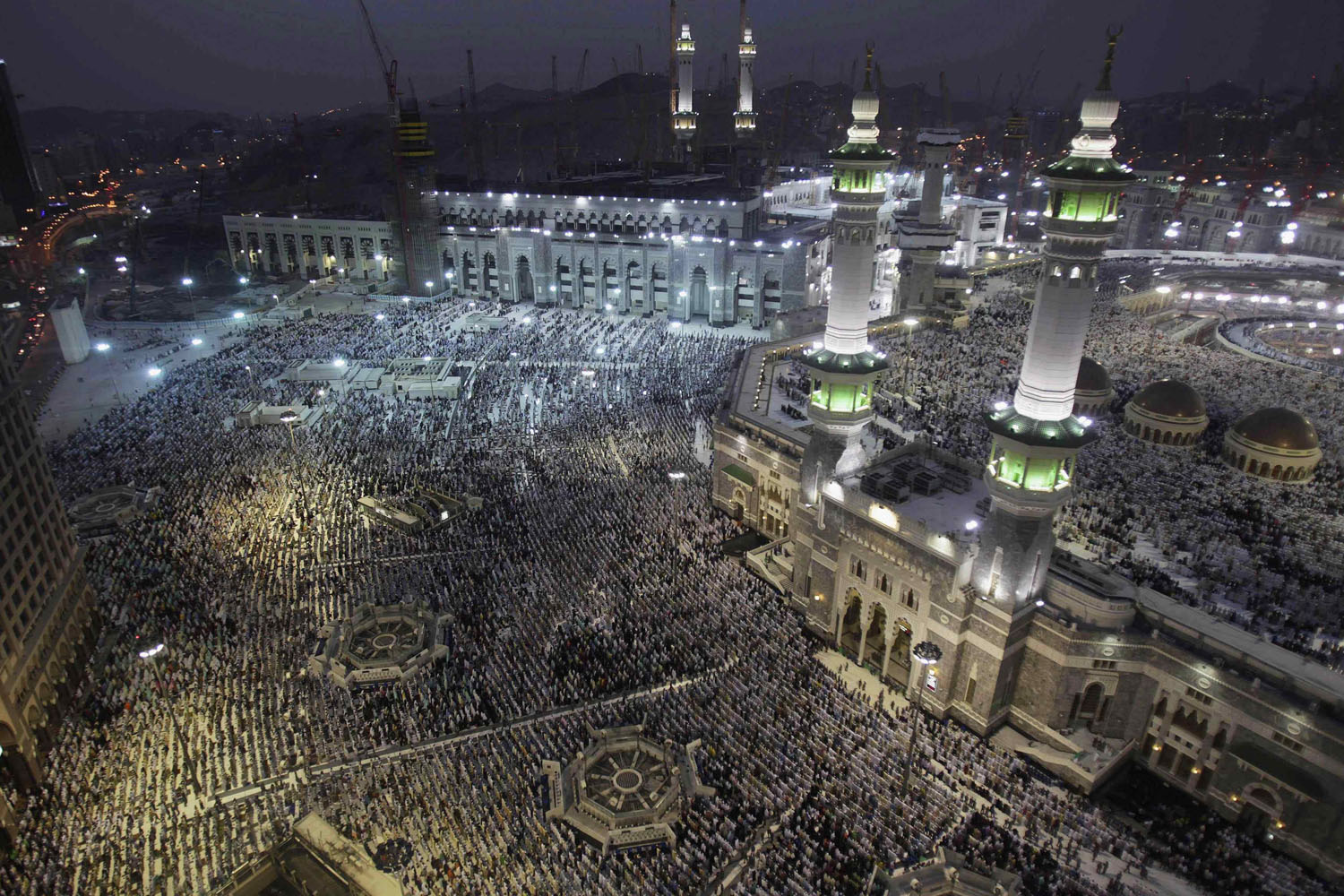 Muslim pilgrims pray at Grand mosque in Mecca, ahead of annual haj pilgrimage