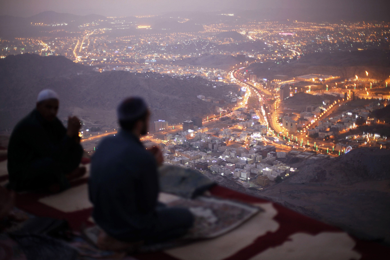 Muslim pilgrims pray atop Mount Thor in the holy city of Mecca ahead of the annual haj pilgrimage