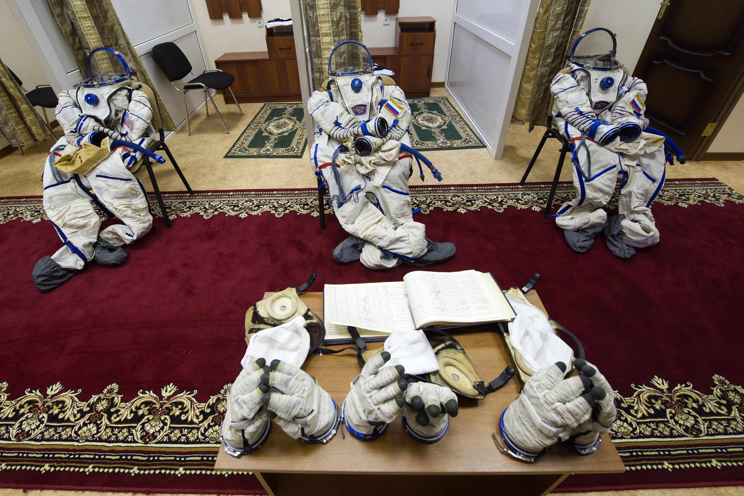 Spacesuits are left on chairs before cosmonauts' training session at the Russian cosmonaut training facility in Star City outside Moscow