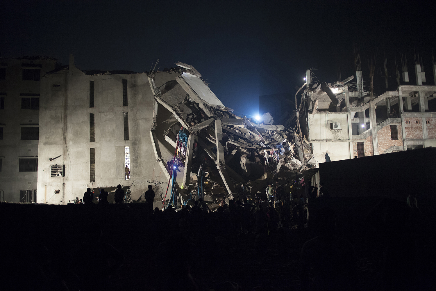 April 25, 2013. The rubble of the collapsed 8-story Savar Rana Plaza garment factory building in Dhaka, Bangladesh.