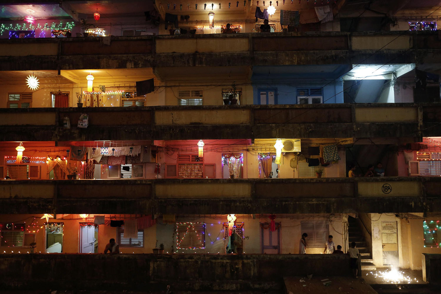 People decorate their houses with lanterns and lights as they celebrate Diwali in Mumbai