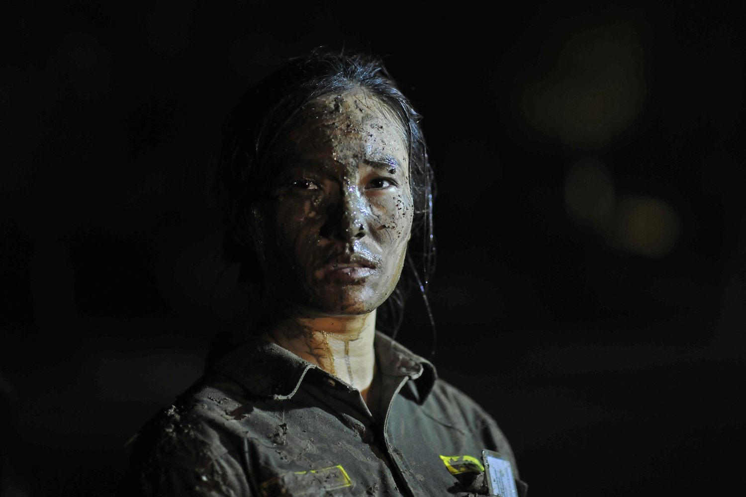 A woman stands during the Tianjiao Special Guard/Security Consultant Ltd. bodyguard training camp in Beijing