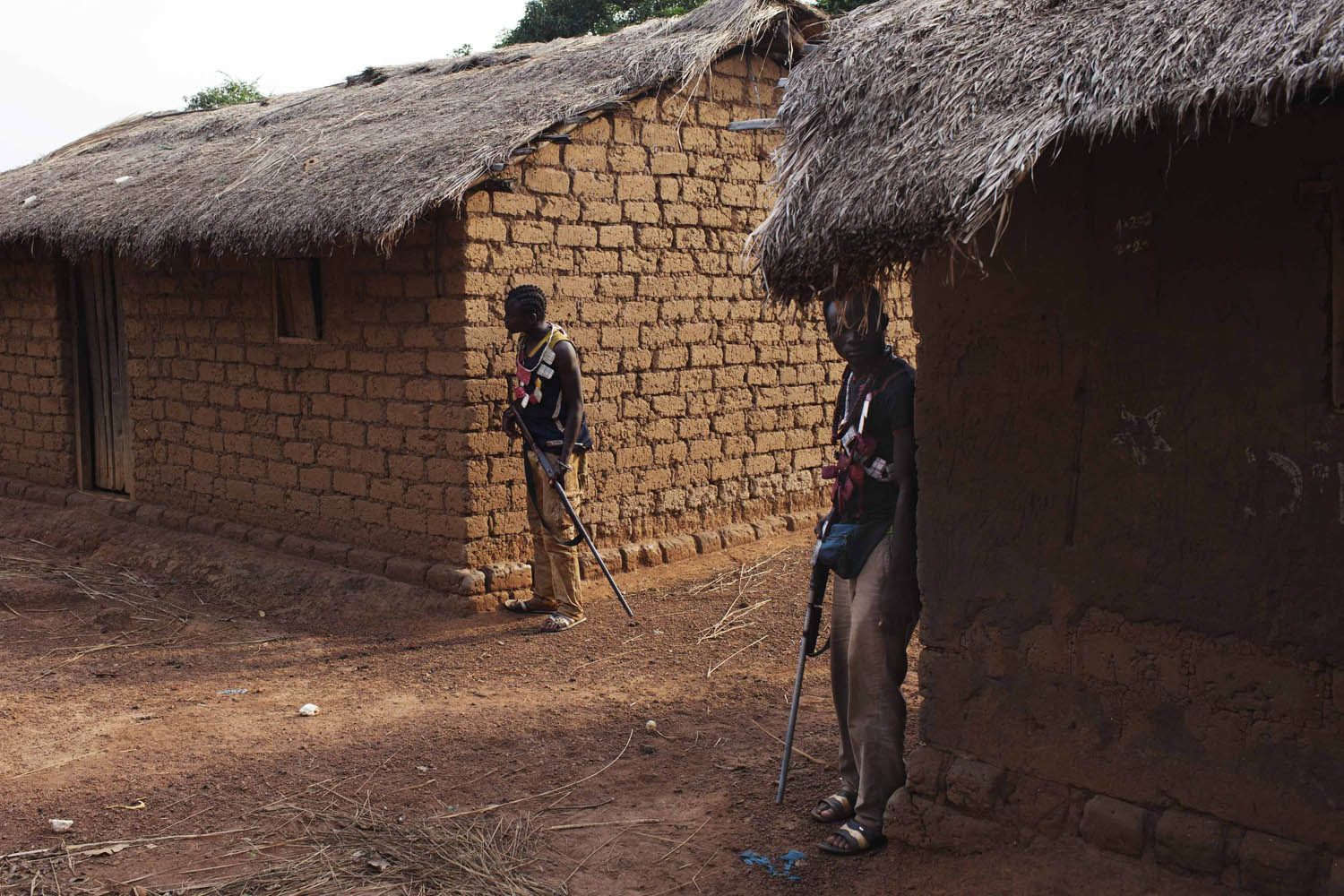 Militia fighters known as anti-balaka stand guard in Mbakate village
