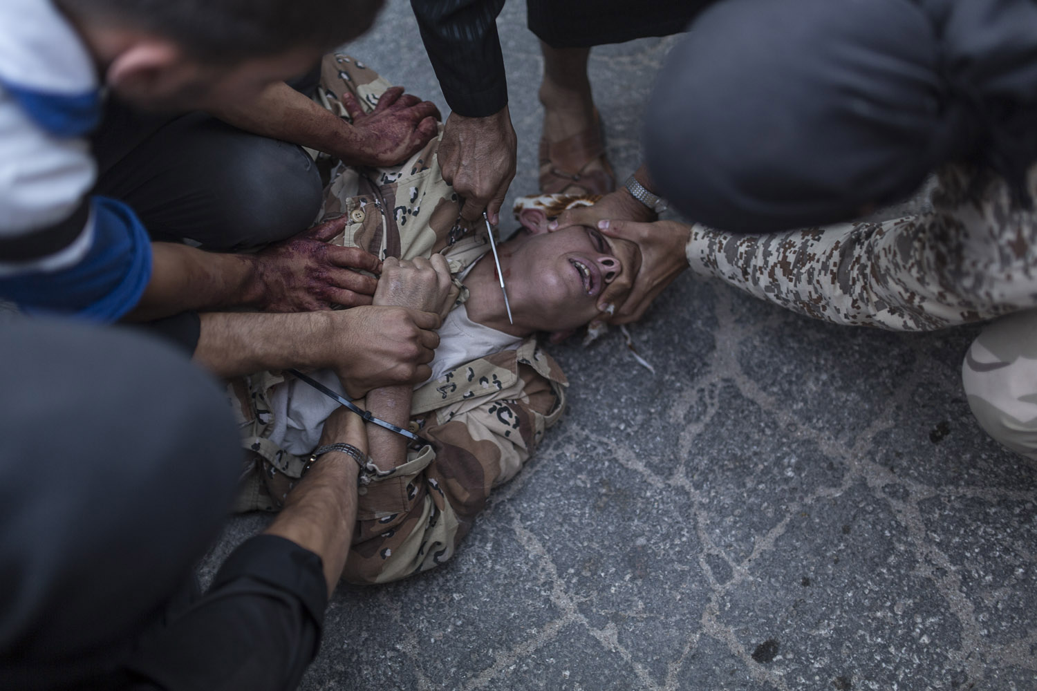 Aug. 31, 2013. A young Syrian man is executed by ant-regime rebels in the town of Keferghan, near Aleppo.