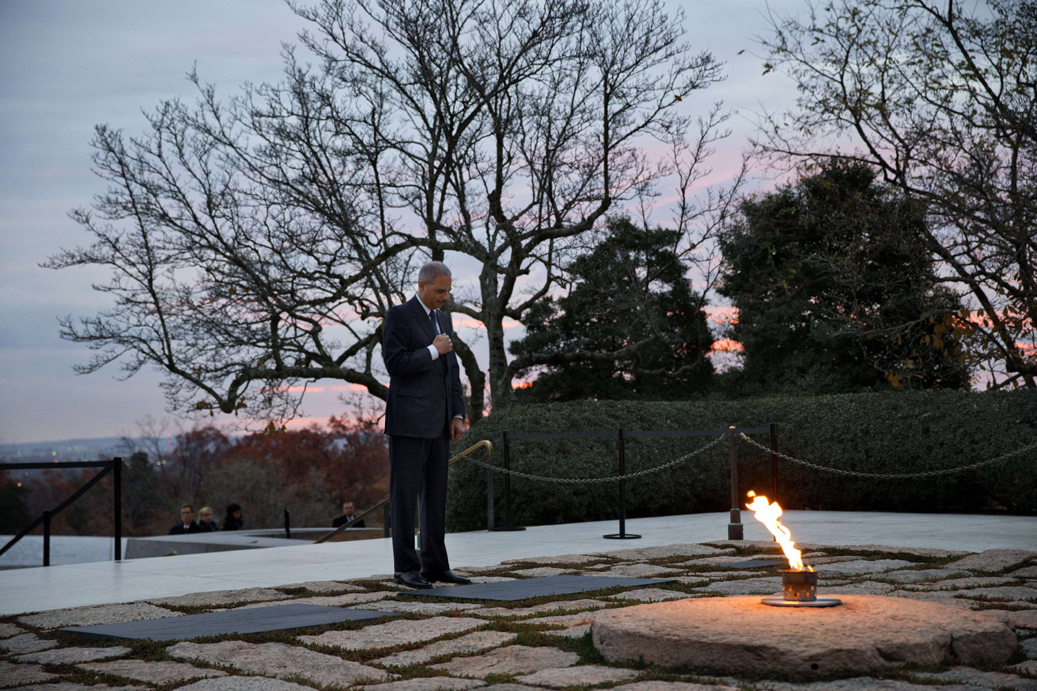 Nov. 22, 2013. U.S. Attorney General Eric Holder pays his respects at the grave of John F. Kennedy at Arlington National Cemetery on  on the 50th anniversary of Kennedy's death.