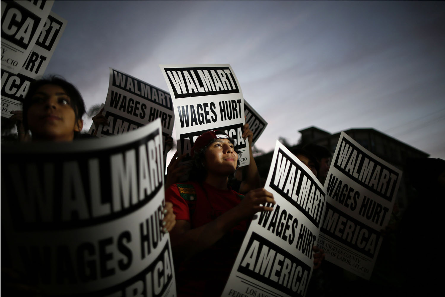 Pedro Taverna takes part in a protest for better wages at which 54 people were arrested outside Wal-mart in Los Angeles