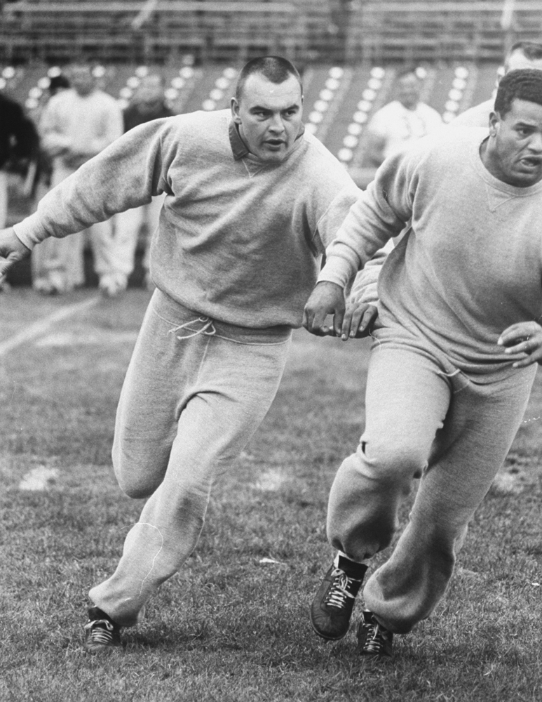 Dick Butkus practices during his rookie season with the Bears in 1965.