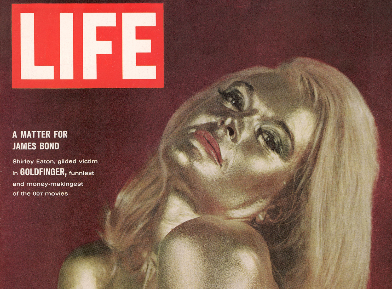 LIFE magazine cover of actress Shirley Eaton in gold body paint for the 1964 James Bond film, 