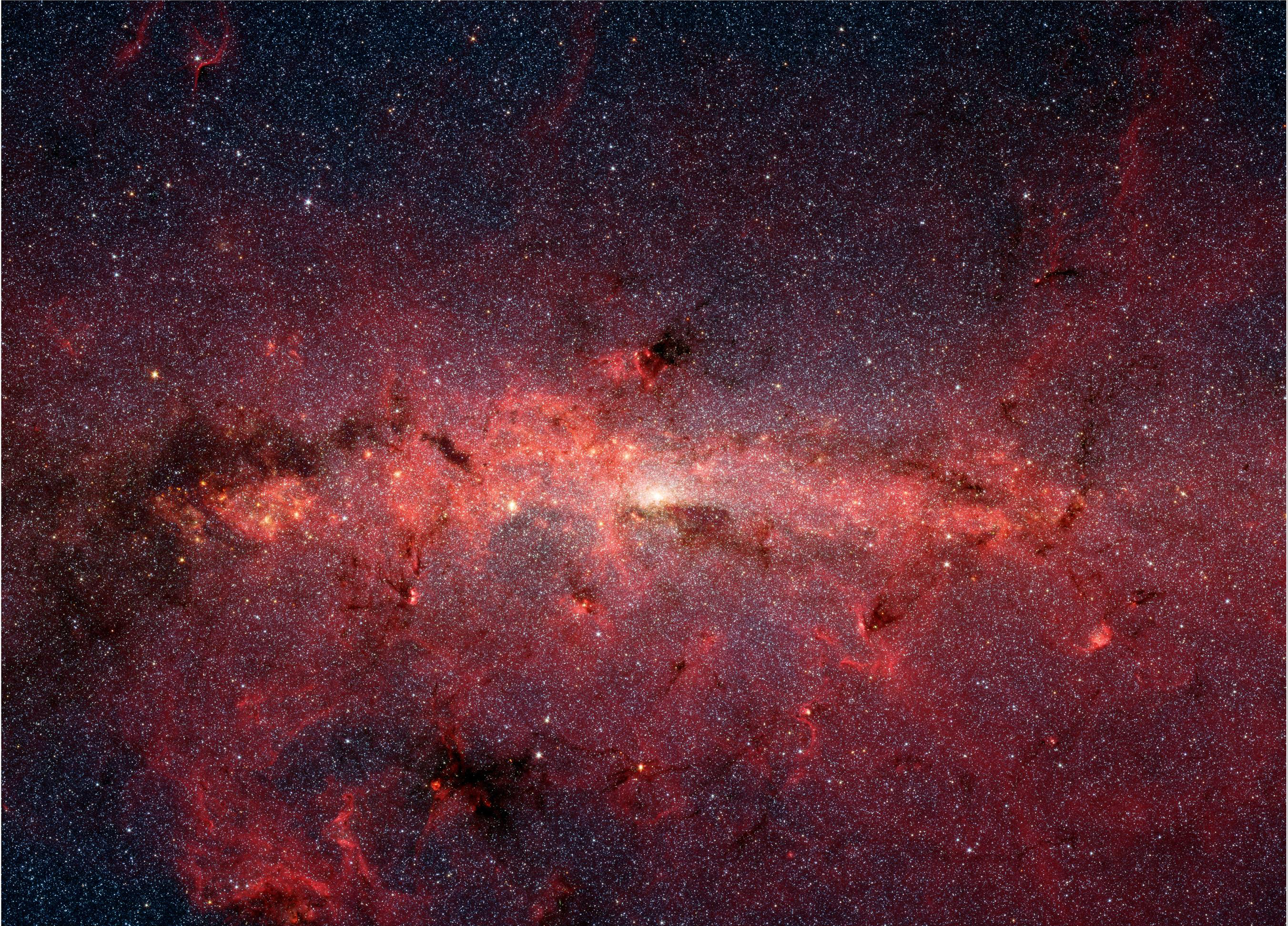 The Spitzer Space Telescope's infrared cameras reveals the stars of the crowded galactic center region of the Milky Way. (NASA / MCT / Getty Images)