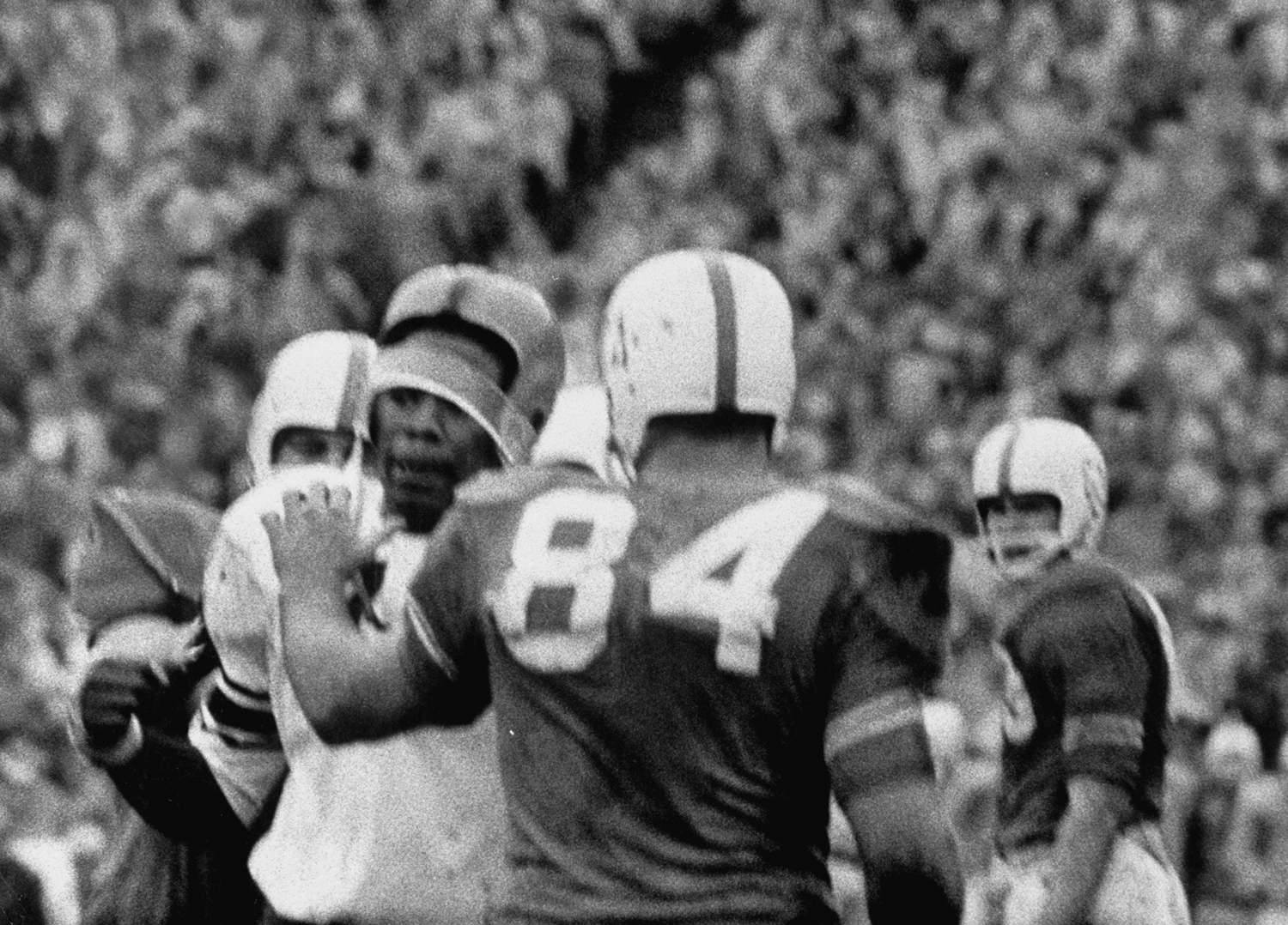 Syracuse player John Brown (in white jersey) in fight over alleged racial insult from Texas player Larry Stephens during 1960 Cotton Bowl.
