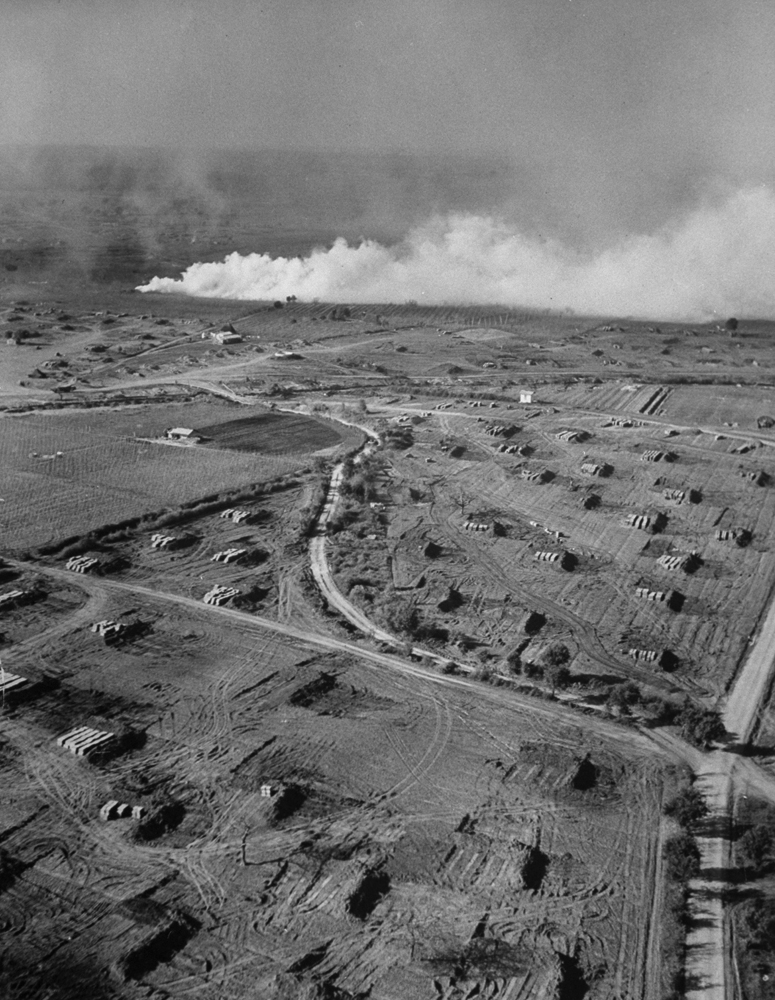 Smoke rises from the German lines during the fight for Anzio, 1944.