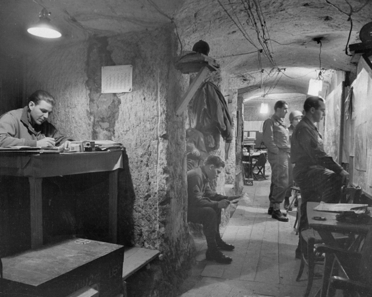 American commanders in underground headquarters, housed in a centuries-old network of catacombs, Anzio, 1944.