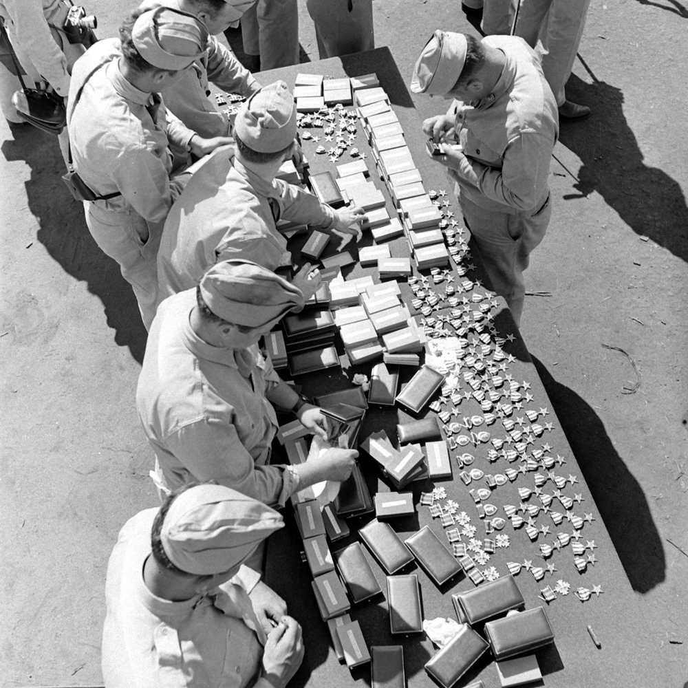 Preparing for a medal ceremony, Anzio, 1944.
