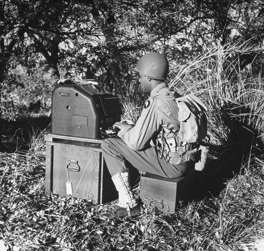 A soldier sends a teletype message, 1943.