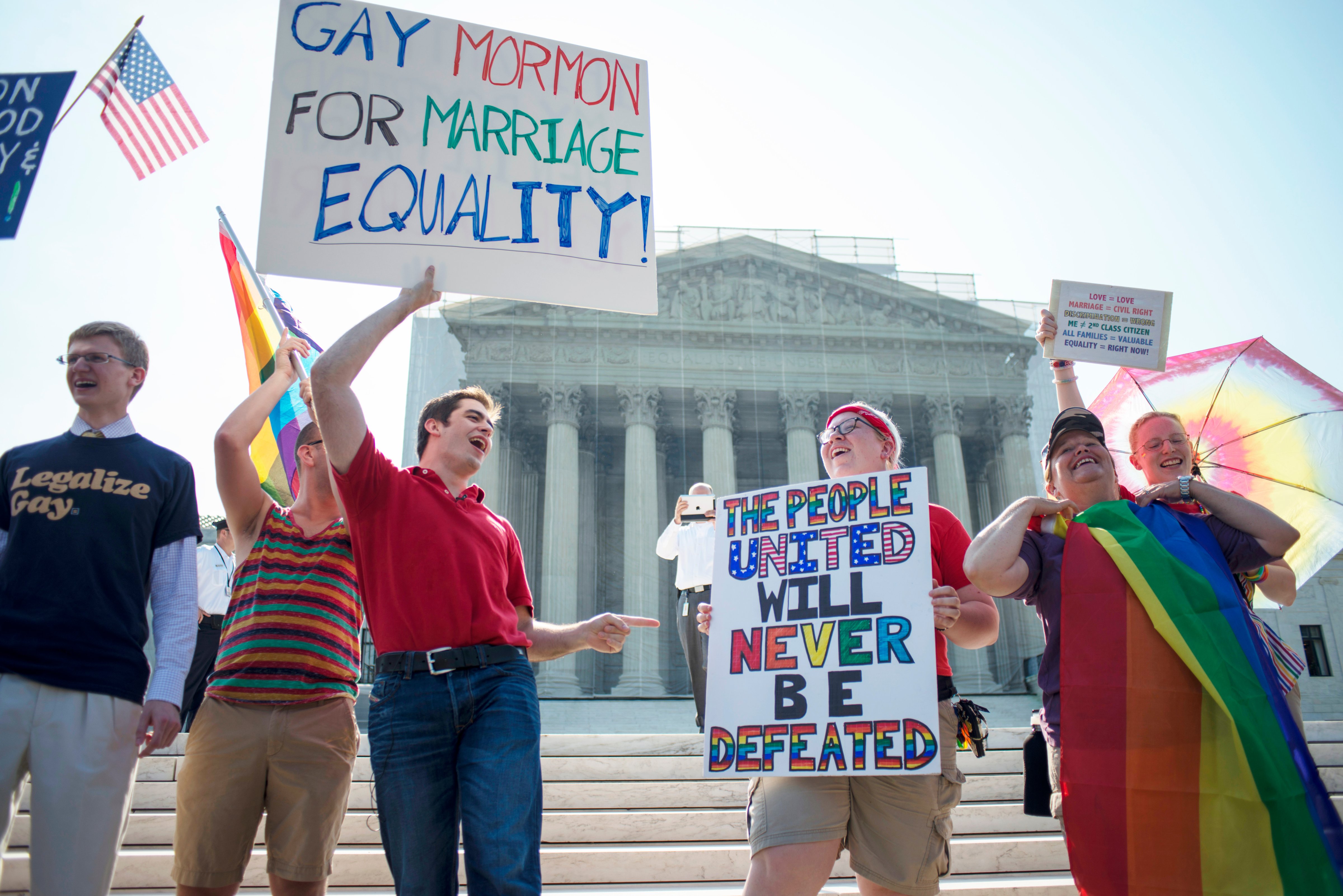 Gay rights supporters cheer and chant outside of the United States Supreme Court waiting for the ruling  on Proposition 8 and the Defense of Marriage Act in Washington, D.C. on June 26, 2013.