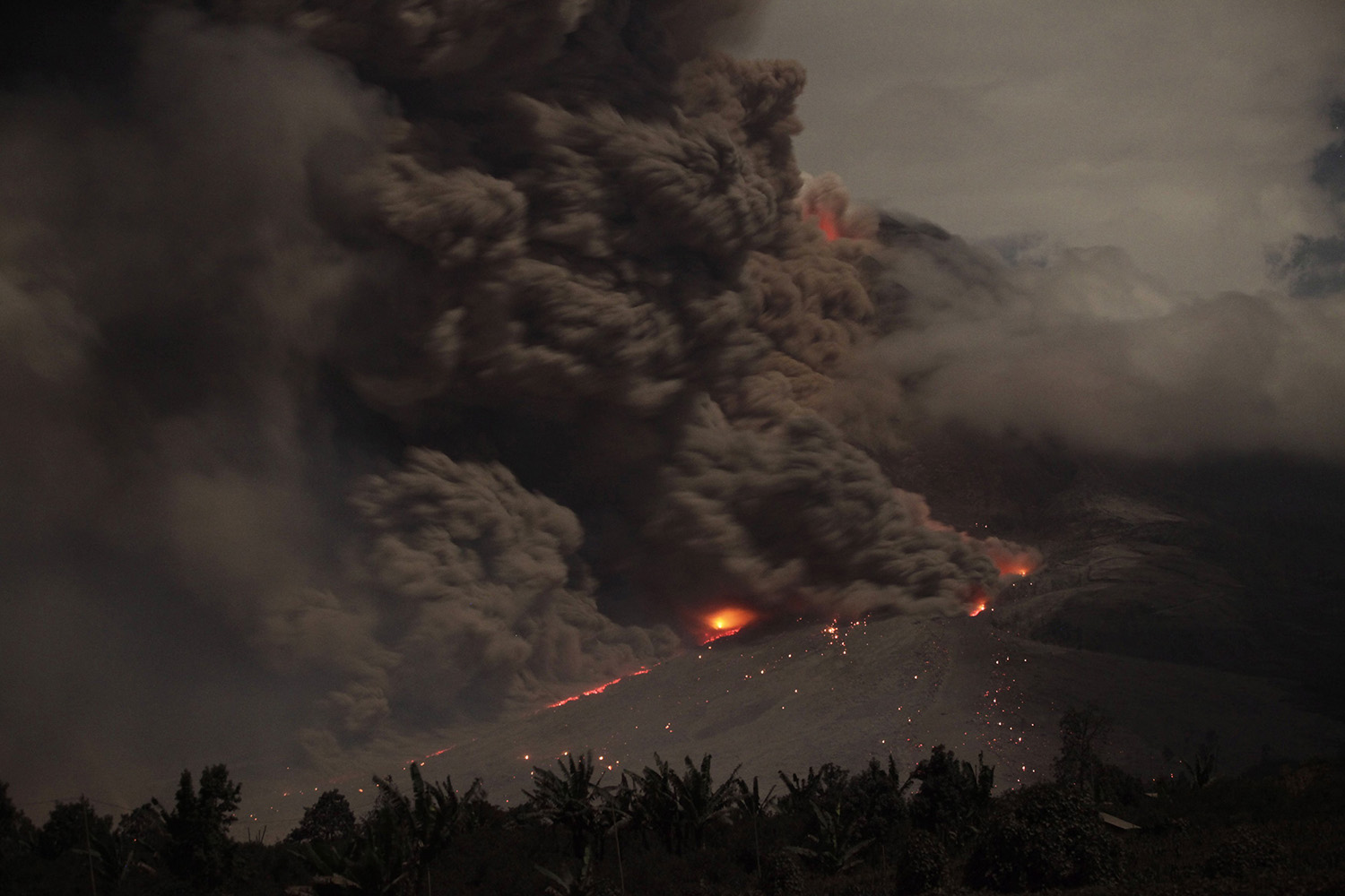 Mount Sinabung erupts as seen from Jraya village in Karo district, Indonesia's North Sumatra province