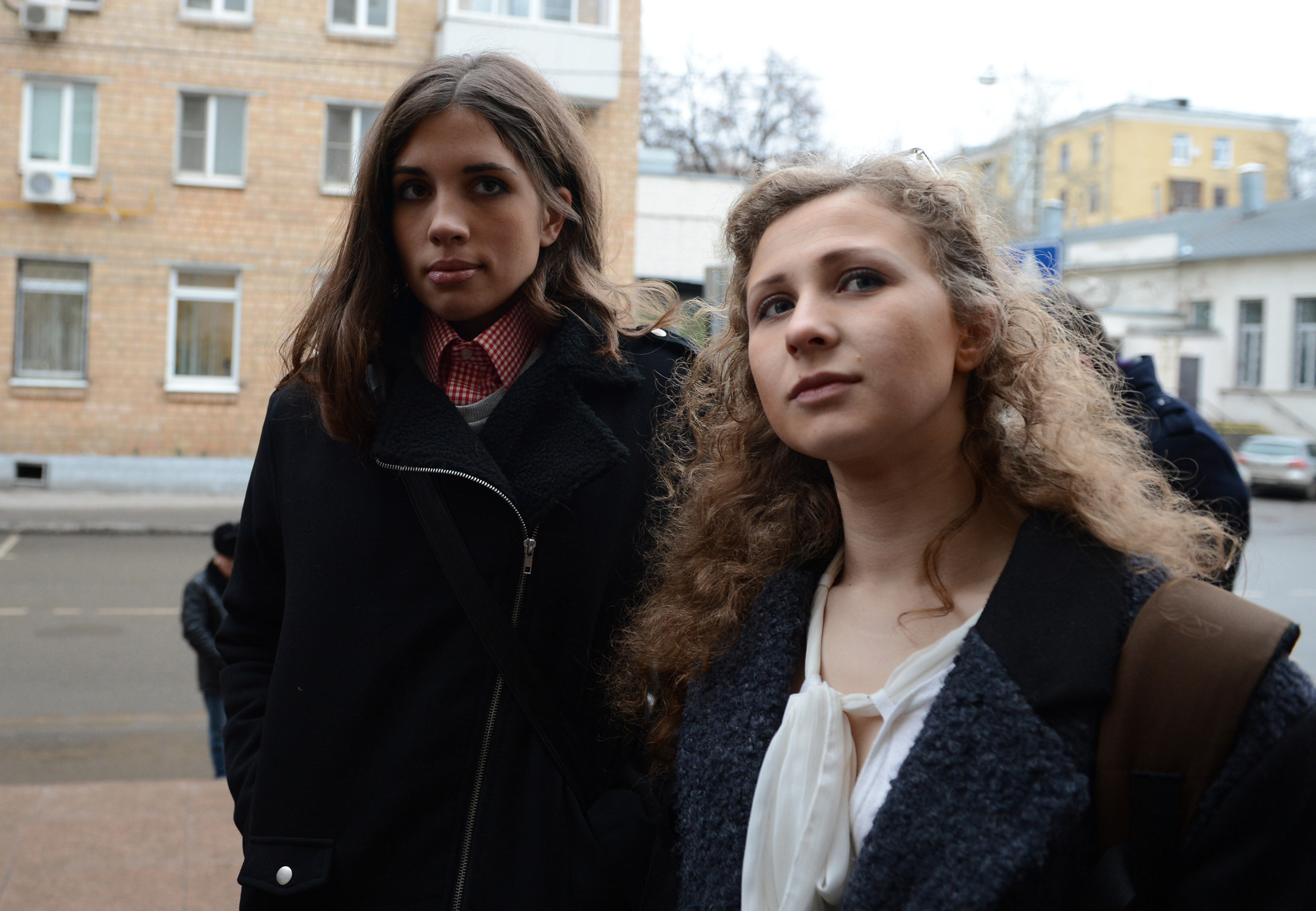 Maria Alyokhina (R) and  Nadezhda Tolokonnikova (L), members of Pussy Riot music club come to the court on January 9 to attend the "Bolotnaya trial" took action after an indignation meeting against Vlaidmir Putin at Bolotnaya Spuare in 2012, Moscow, Russia (Sefa Karacan / Anadolu Agency / Getty Images)