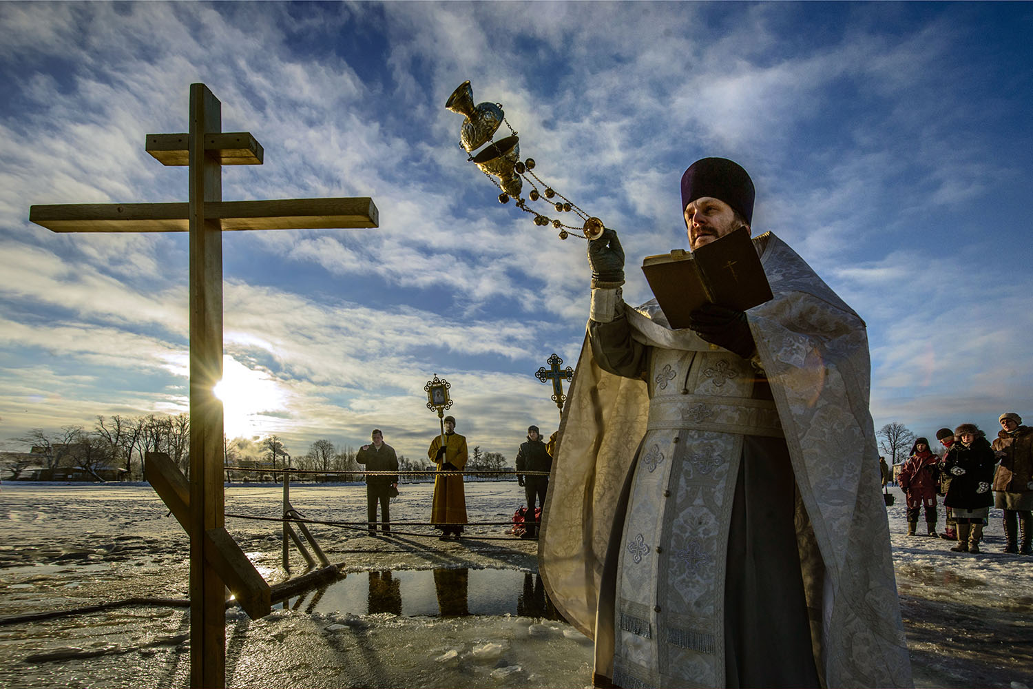 Jan. 19, 2014. Priest consecrates water during a celebration of Epiphany not far away from Saint-Petersburg in Petergof, Russia.