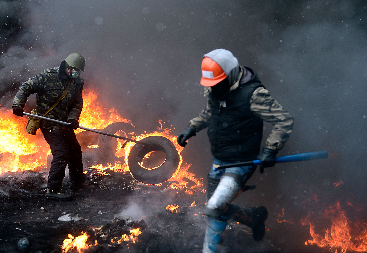Three people were reported dead in Kiev on Wednesday morning, during clashes between police and demonstrators against the government's anti-protest law in Kiev, Jan. 22, 2014.