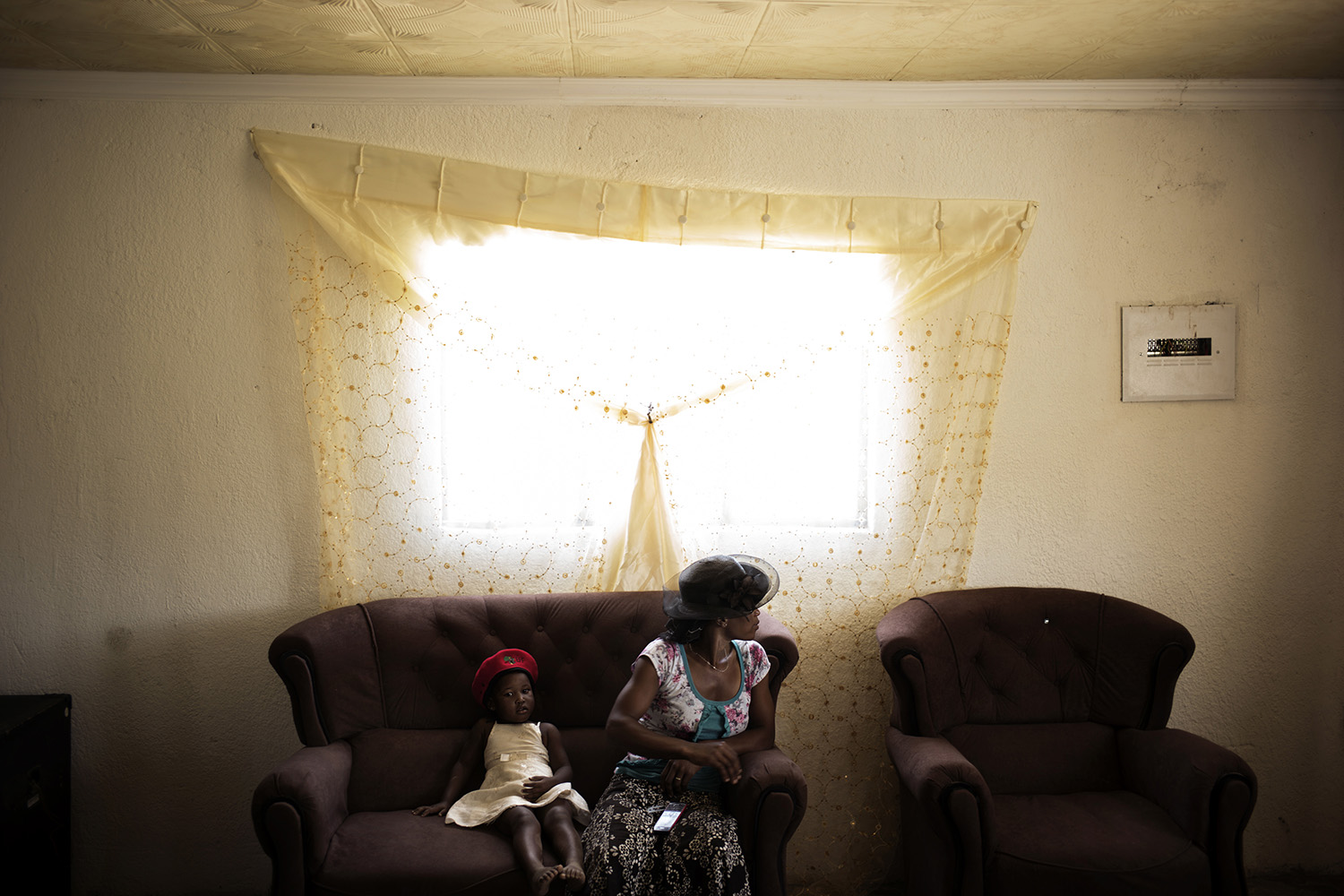 Jan. 22, 2014. Sthandiwe Hlongwane, 31, sits with her daughter inside a newly built house she received from the Economic Freedom Fighters leader and former ANC youth leader Julius Malema in Nkandla, South African .