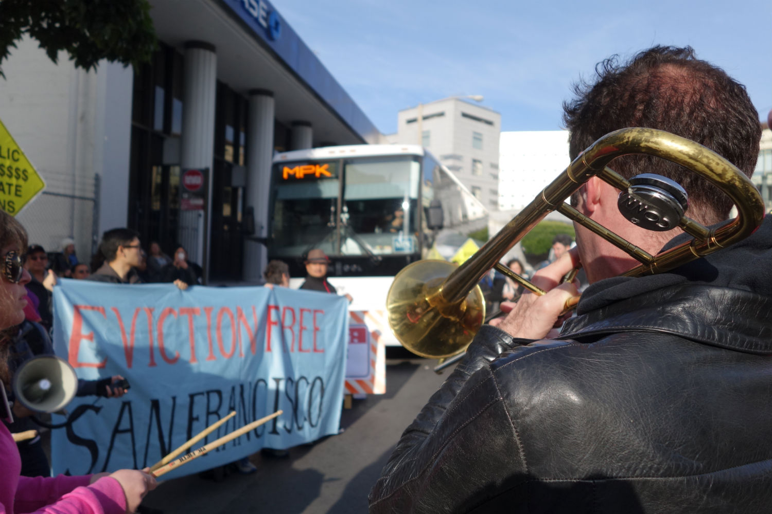 Anti-eviction protestors, including a band called the Brass Liberation Orchestra, block a private shuttle taking Facebook employees to the company headquarters in Menlo Park, Calif. on Jan. 21, 2013. (Katy Steinmetz / TIME)