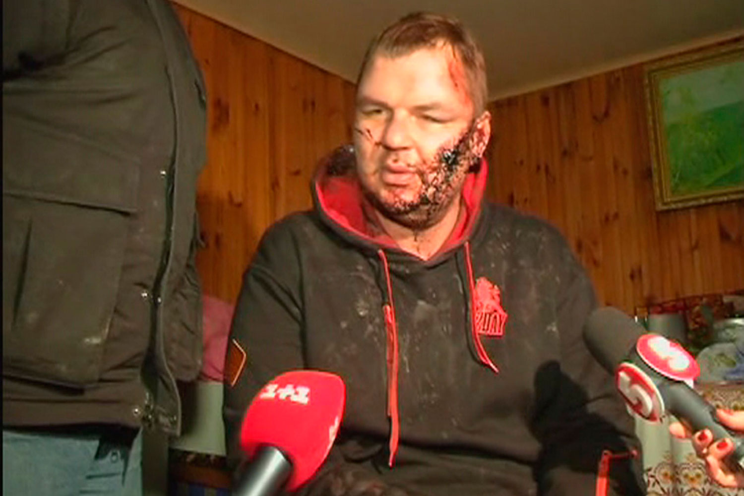 Dmytro Bulatov, 35, one of the leaders of anti-government protest motorcades called 'Automaidan', speaks to journalists after being found near Kiev, Jan. 30, 2014. (Reuters)