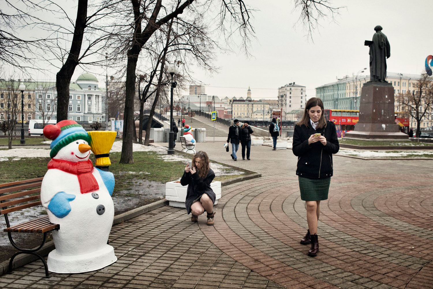Nadezhda Tolokonnikova and Maria Alyokhina walk in downtown Moscow.