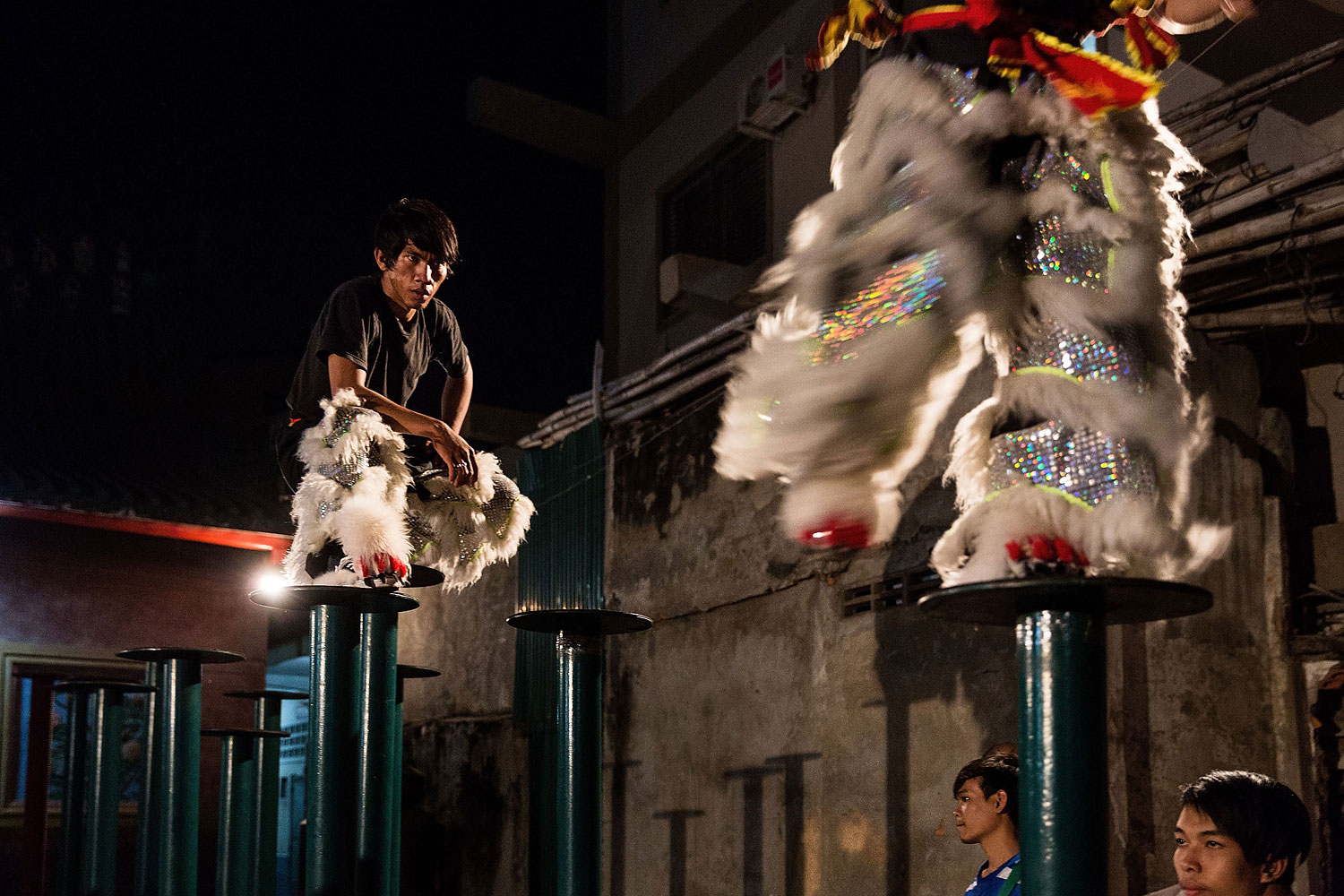 A Lion Dancer takes a break during a practice session on Jan. 29, 2014 in Phnom Penh, Cambodia.