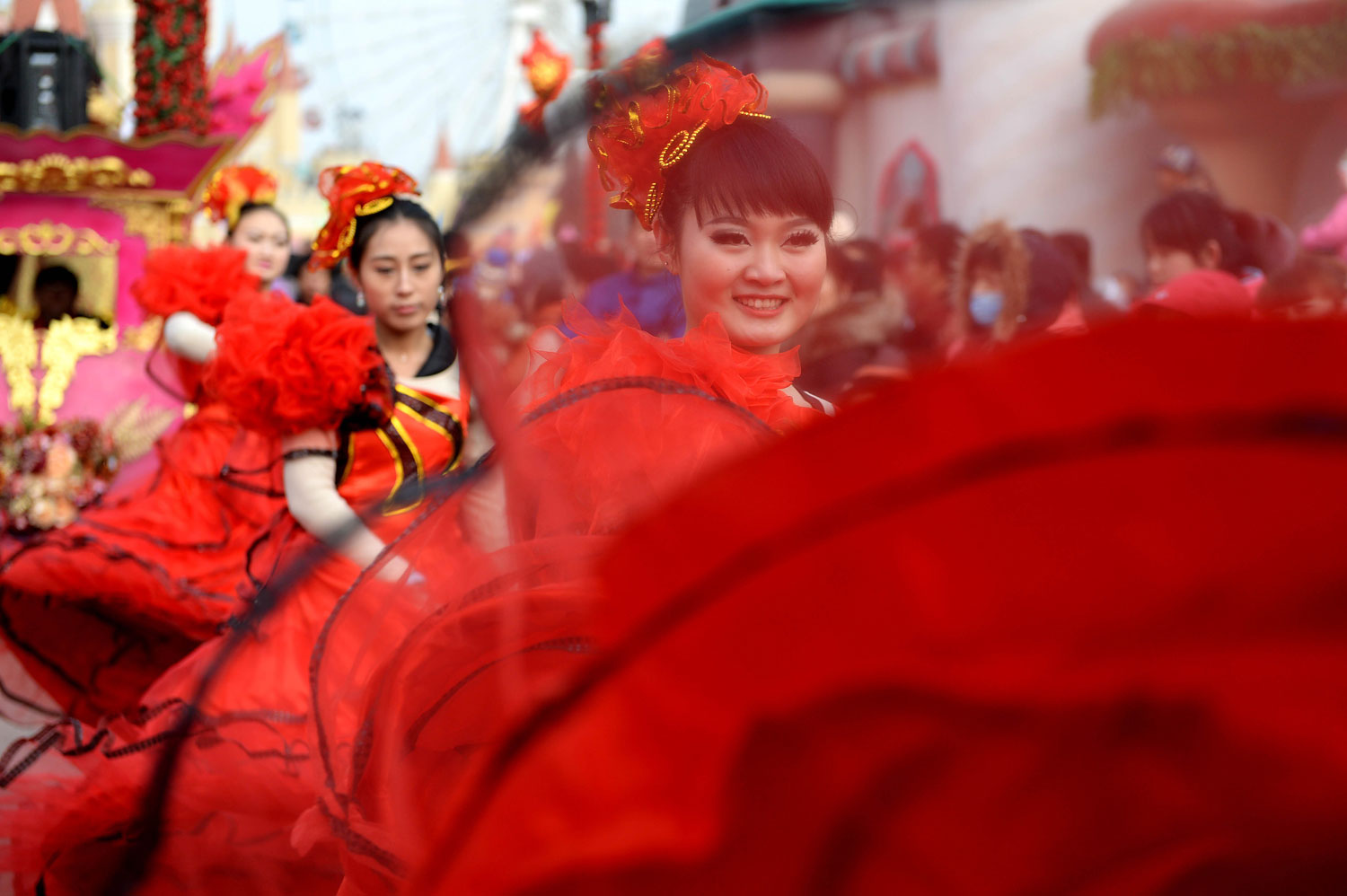 Performers dance during a temple fair to celebrate the Spring Festival, or the Chinese Lunar New Year, in Beijing, Jan. 31, 2014.
