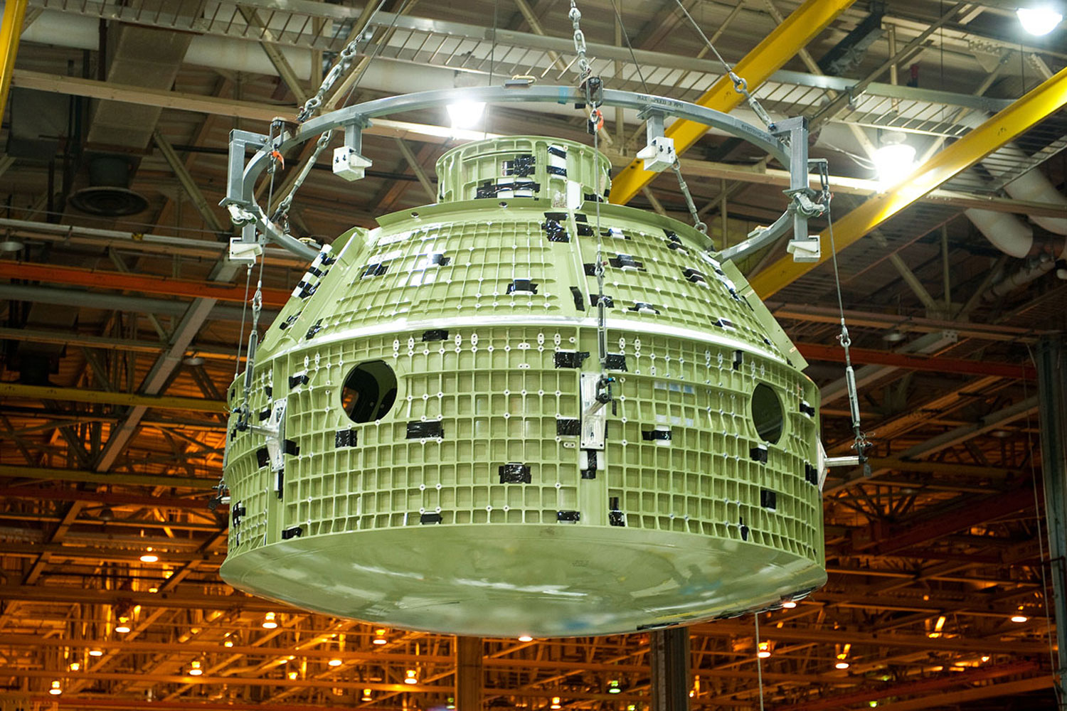 The NASA team at the Michoud Assembly Facility in New Orleans has completed the final weld on the first space-bound Orion capsule, on June 22, 2012. The crew compartment is within this structure, which is then enclosed in the conical exterior.