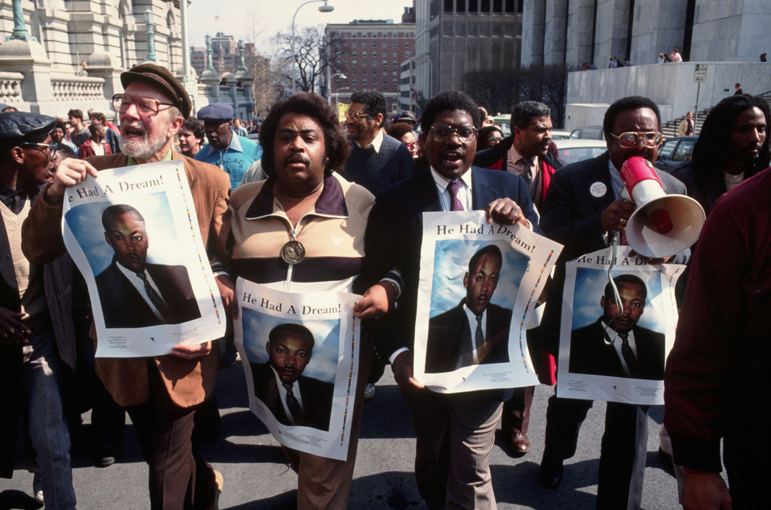From left: Pete Seeger, Al Sharpton and other civil rights activists lead a demonstration in protest of the Tawana Brawley incident, in Albany, N.Y., in March 1988.