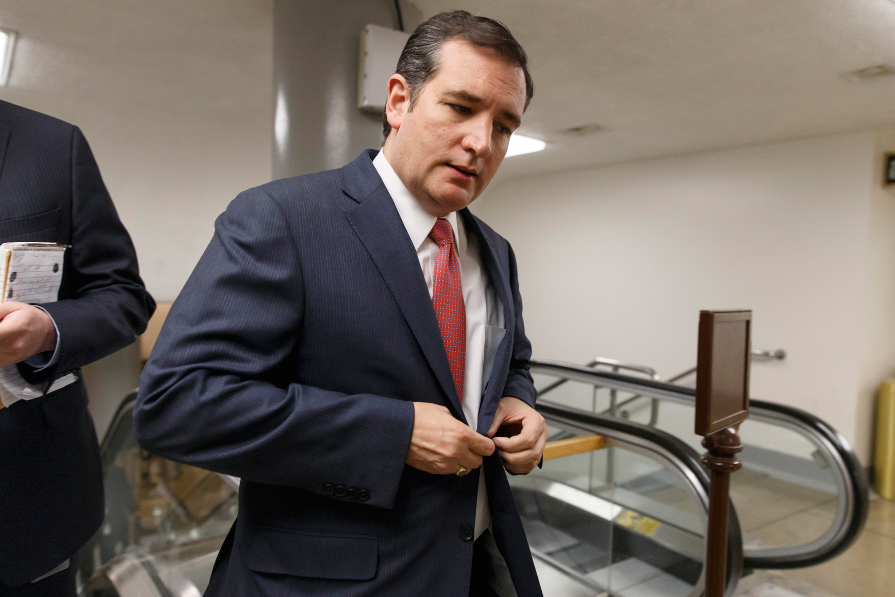 Sen. Ted Cruz arrives at the Capitol as the Senate votes to approve a $1.1 trillion spending package on Jan. 16. It may be the last sign of progress for a while. (J. Scott Applewhite / AP)