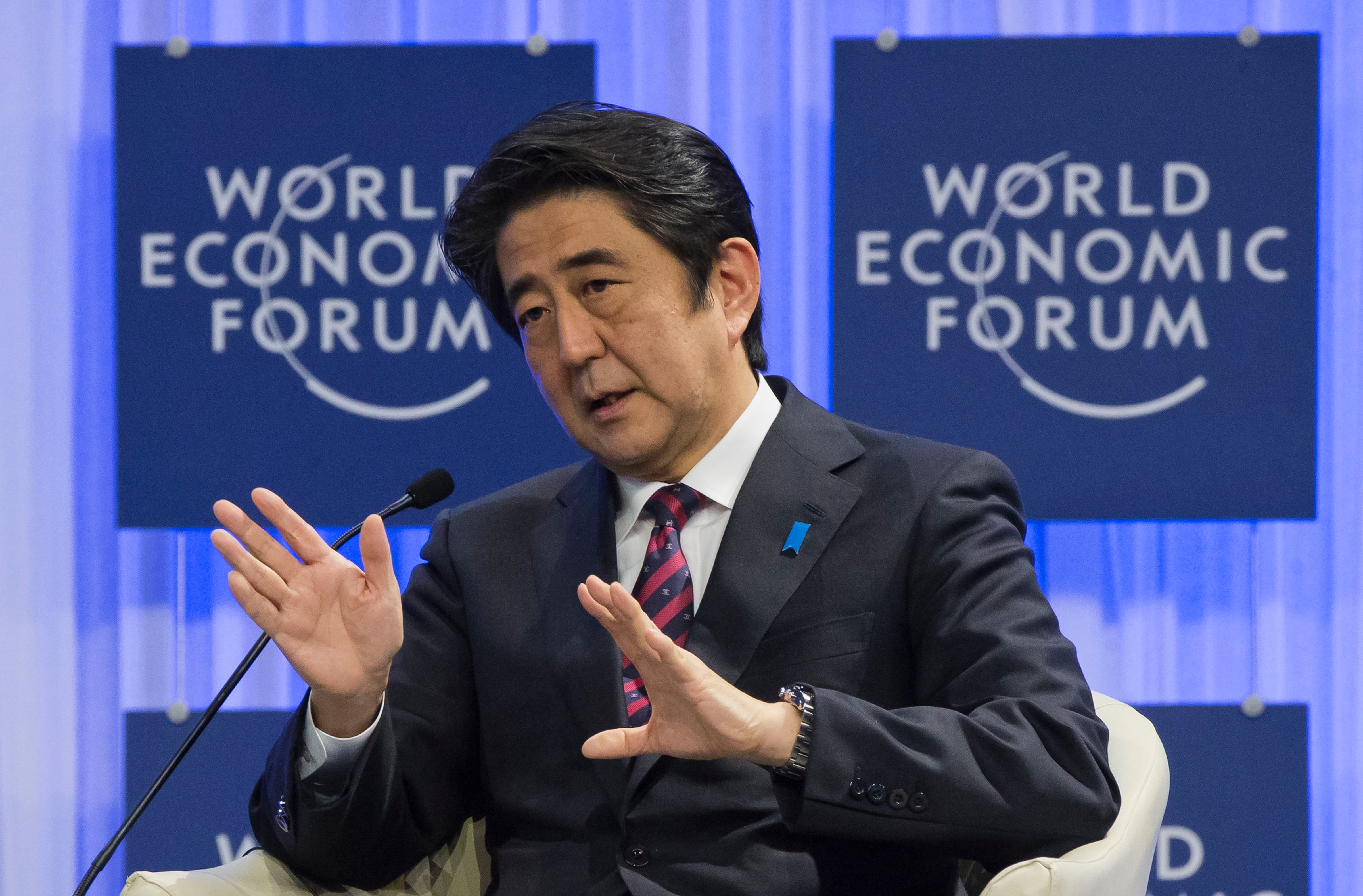 Japanese Prime Minister Shinzo Abe speaks at the World Economic Forum in Davos, Switzerland, on Jan. 22, 2014 (Michel Euler / AP)