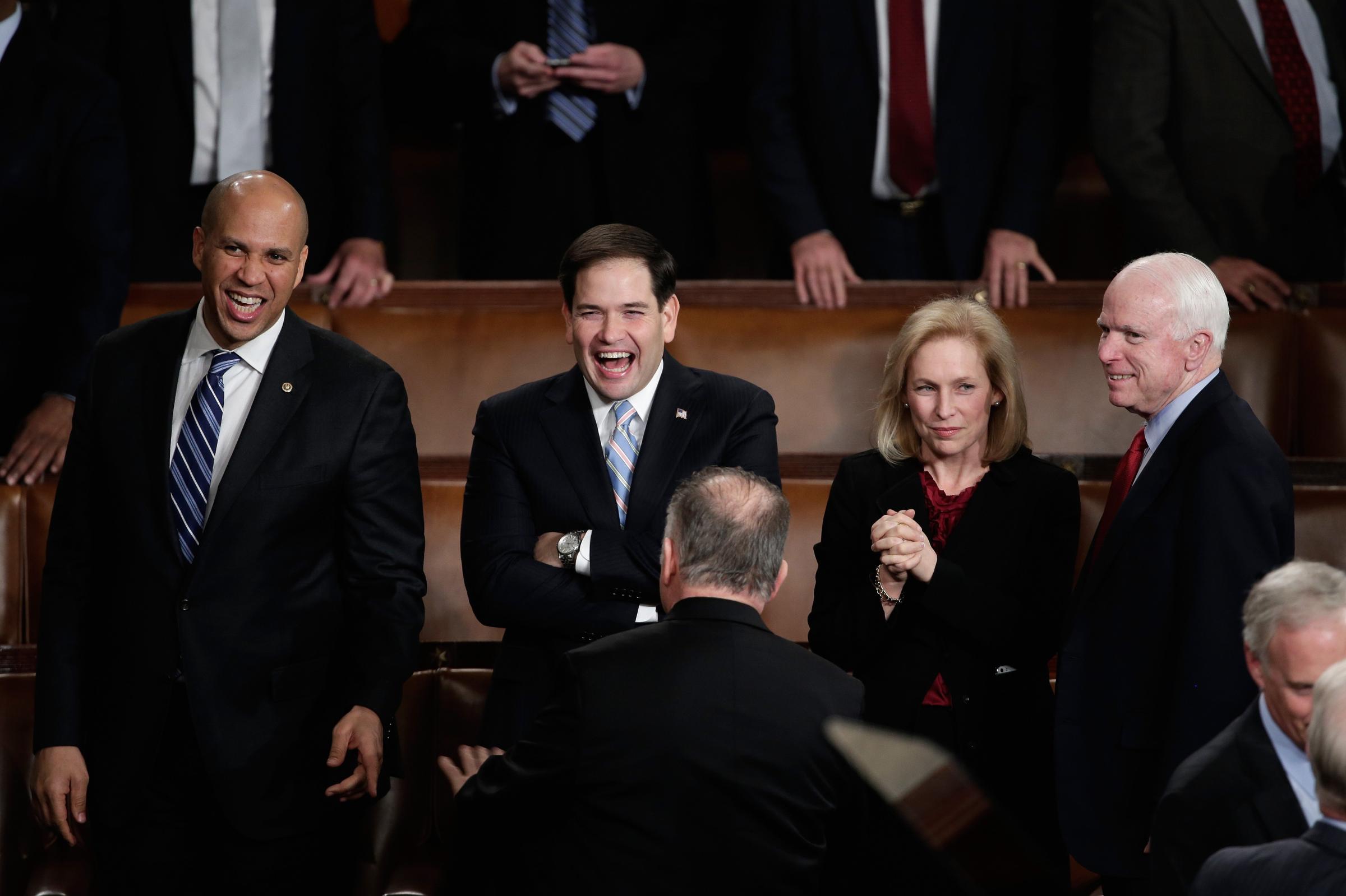 Senators Cory Booker, Marco Rubio, Kristen Gillibrand, John McCain mingle before the State of the Union.