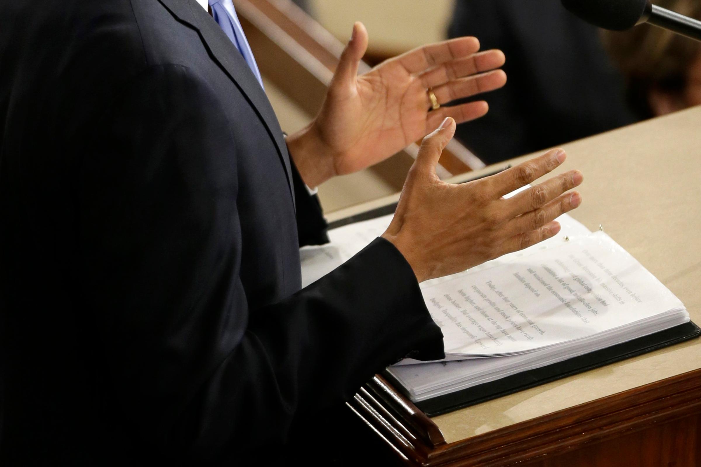 President Barack Obama gestures as he delivers his State of the Union address.