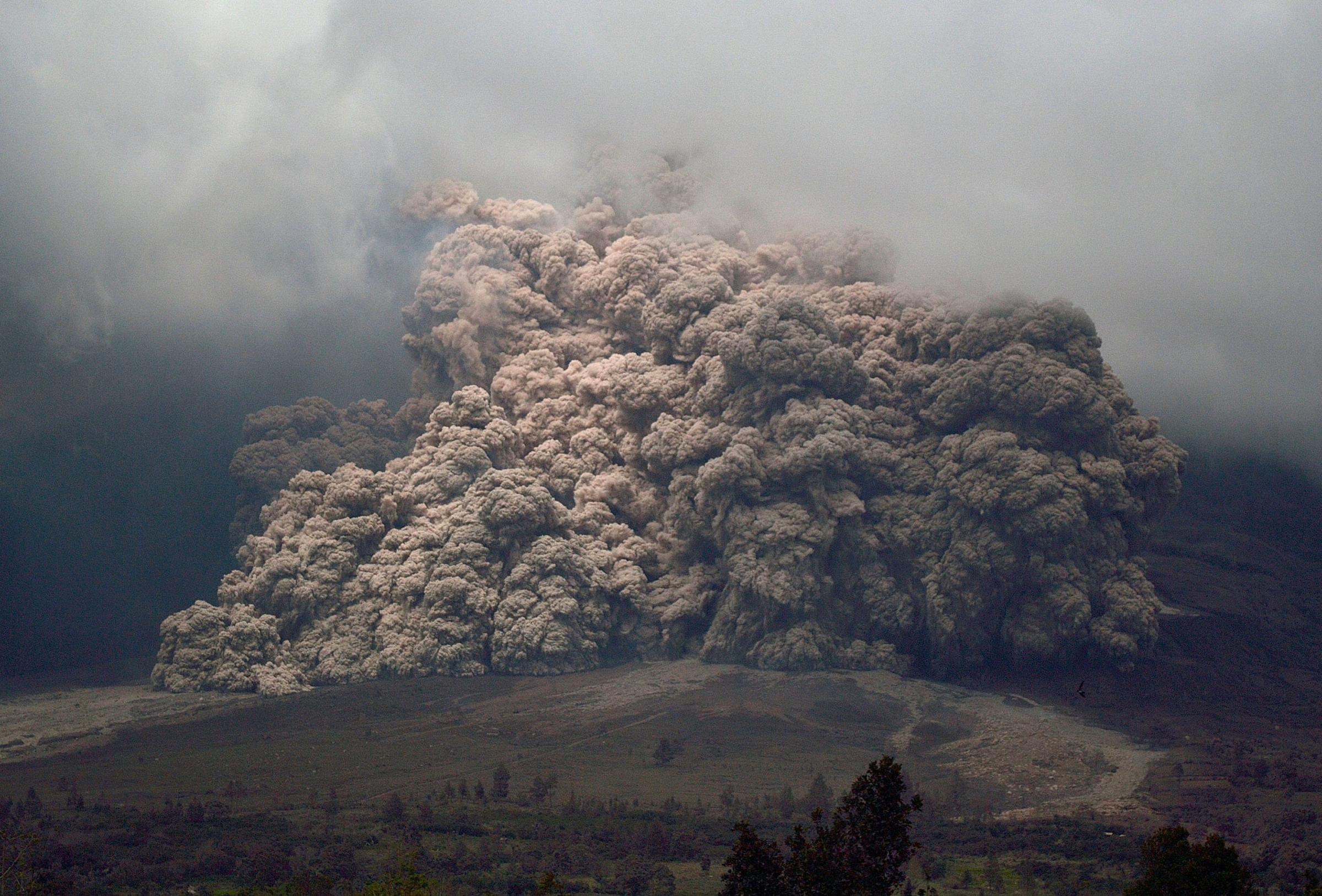 Sinabung mount spews ash to the air during an eruption near Karo, North Sumatra, Indonesia, Jan. 7, 2014.