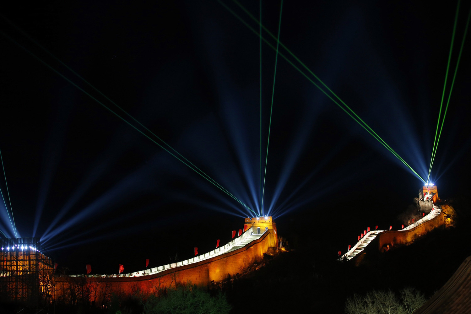 Light and laser illuminate the Great Wall of China to celebrate the new year at the Badaling section of the Great Wall, in Beijing