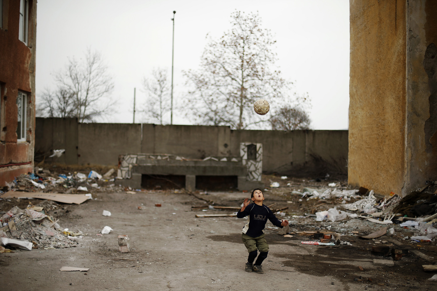 Jan. 21, 2014. A Syrian refugee boy plays with a ball at a refugee centre in the town of Harmanli, some 250 km (155 miles) southeast of Sofia, Bulgaria.
