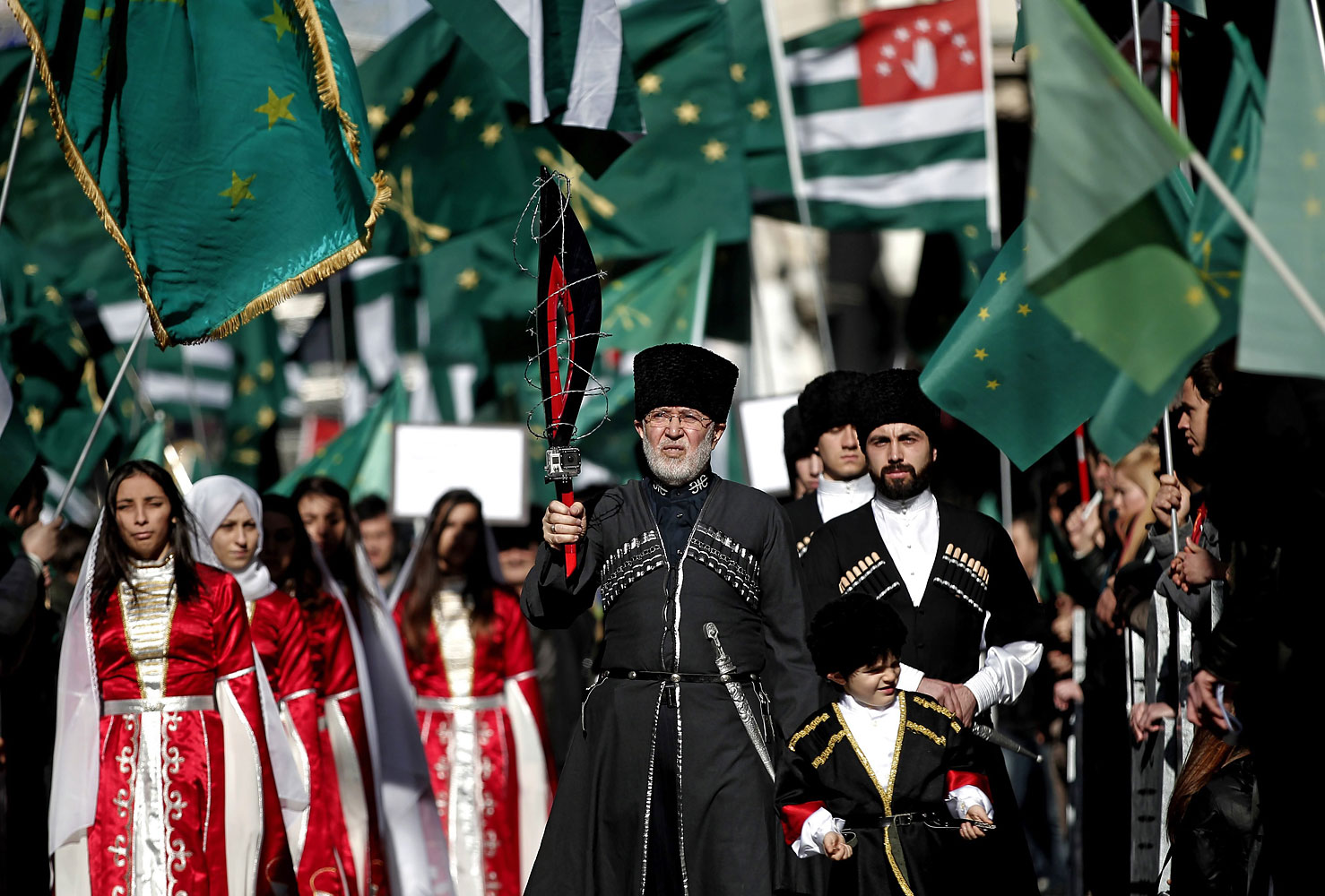 Members of a Circassian ethnic group shout slogans during a protest against the Olympics in front of the Russian Consulate in Istanbul, Feb. 2, 2014. (Sedat Suna / EPA)