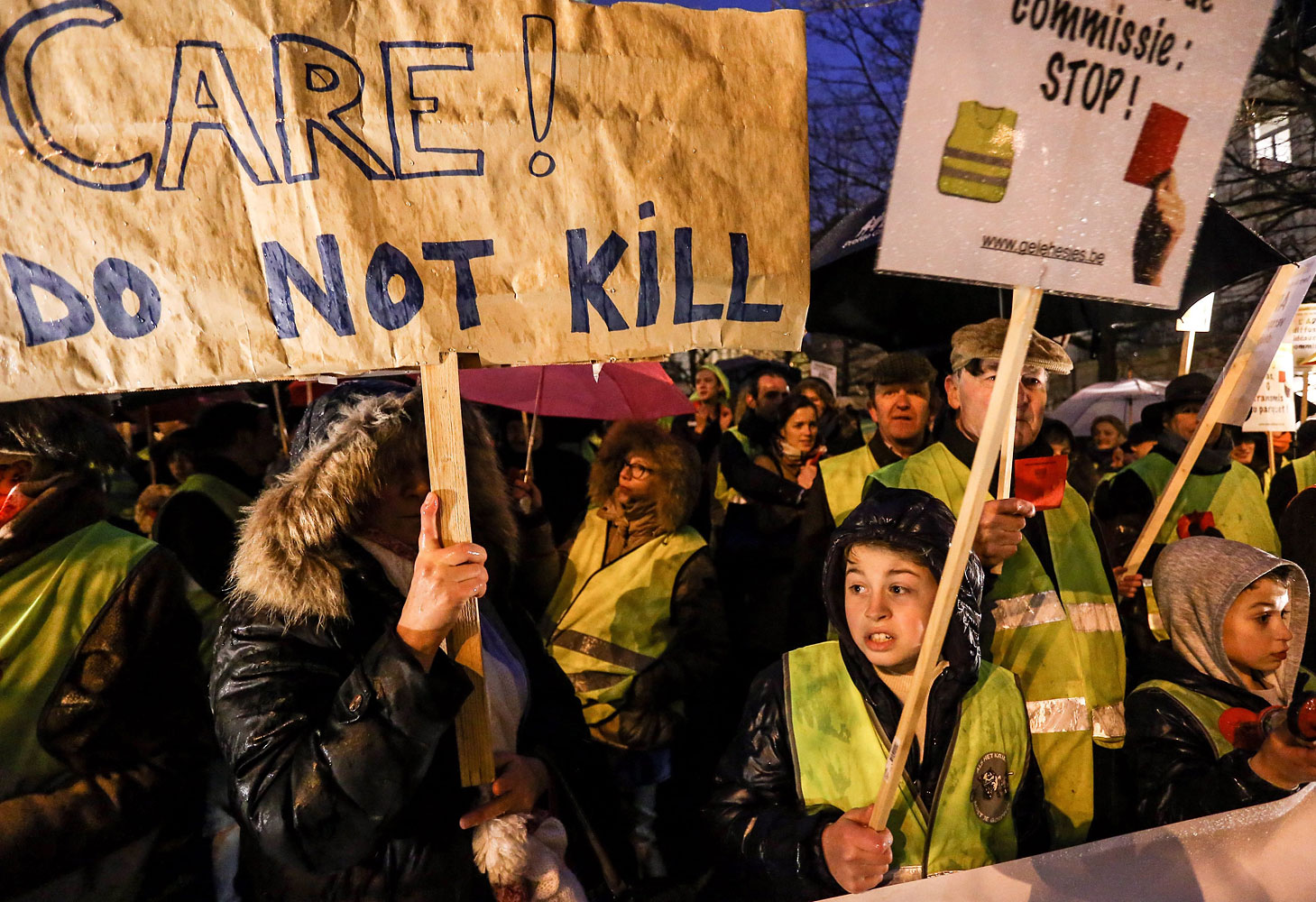 Activists of the collective Yellow Safety Jacket protest against the proposed statutory amendment legalizing the euthanasia of young children, in Brussels, Feb. 11, 2014.