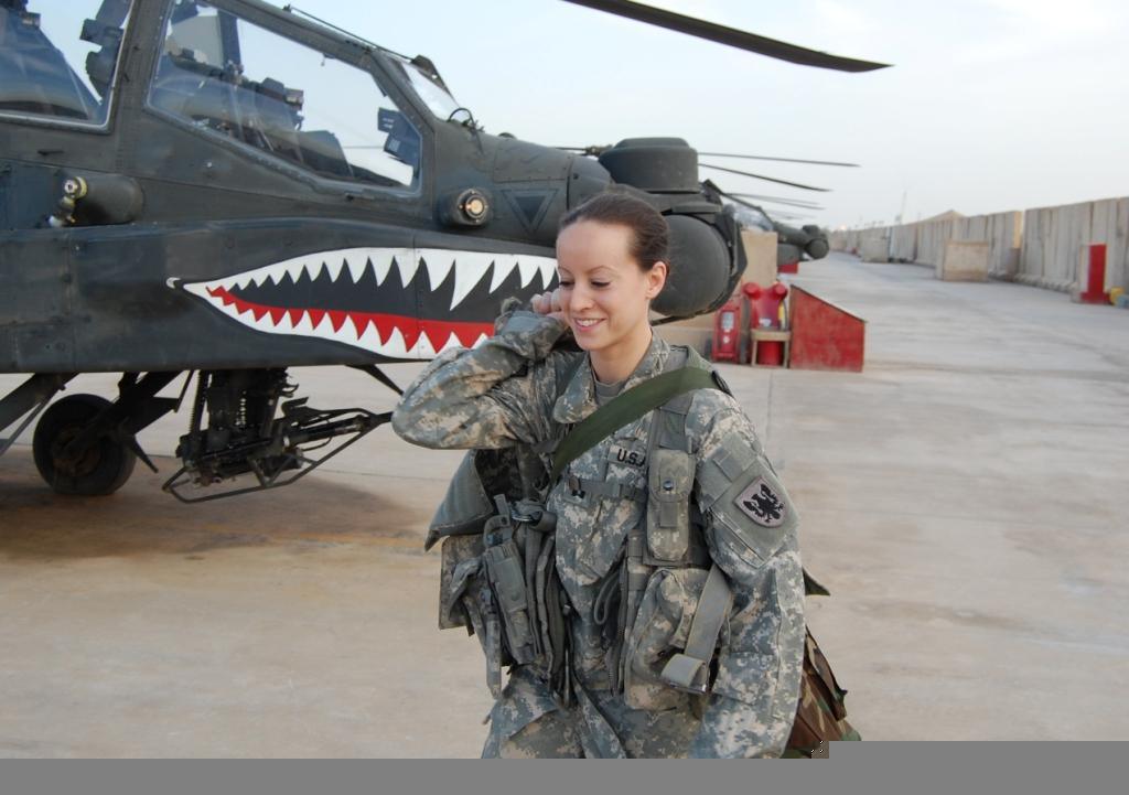 U.S. Army Captain Elizabeth McNamara, an AH-64 pilot, on the flight line in Iraq in 2011